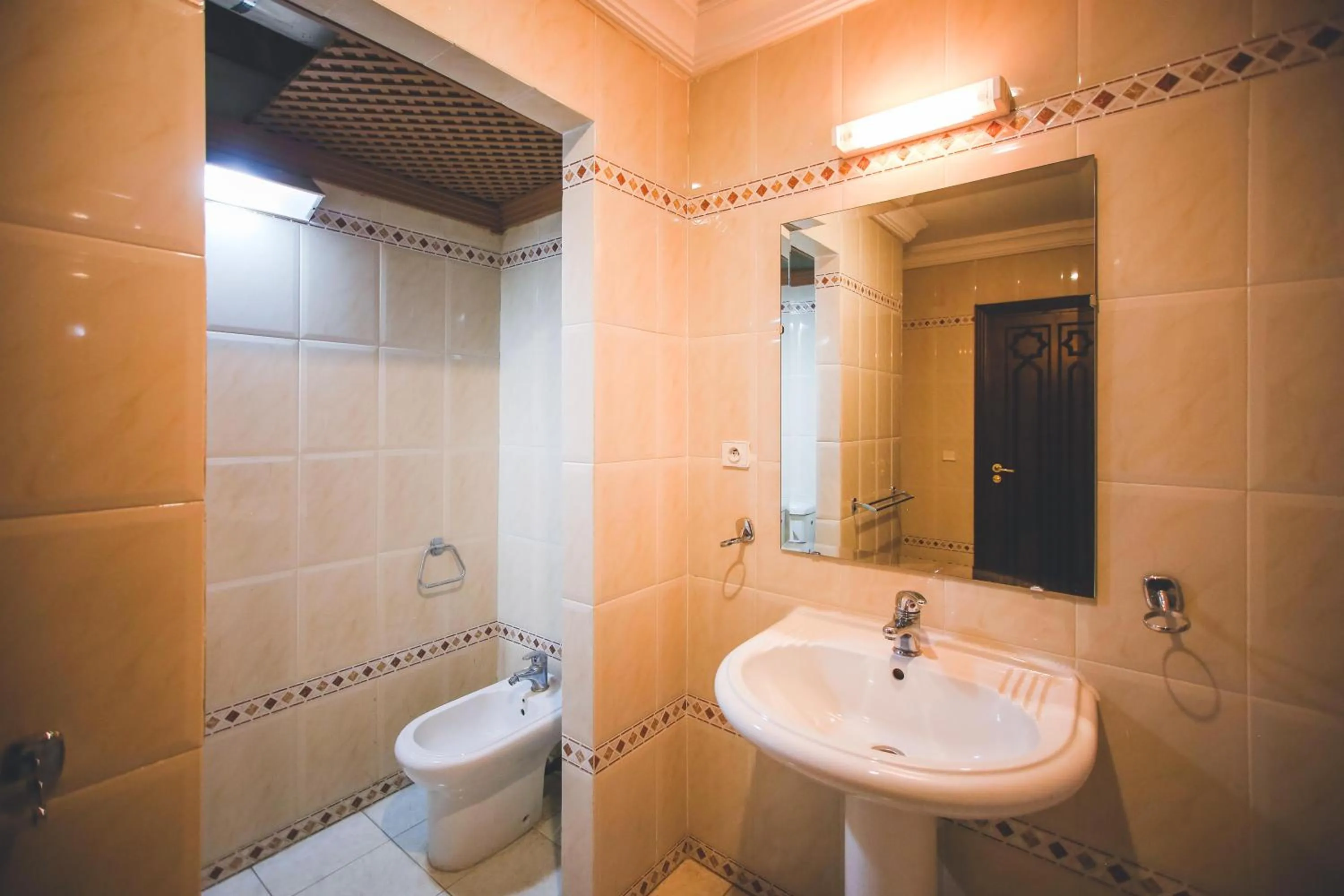 Shower in Appart Hotel Alia