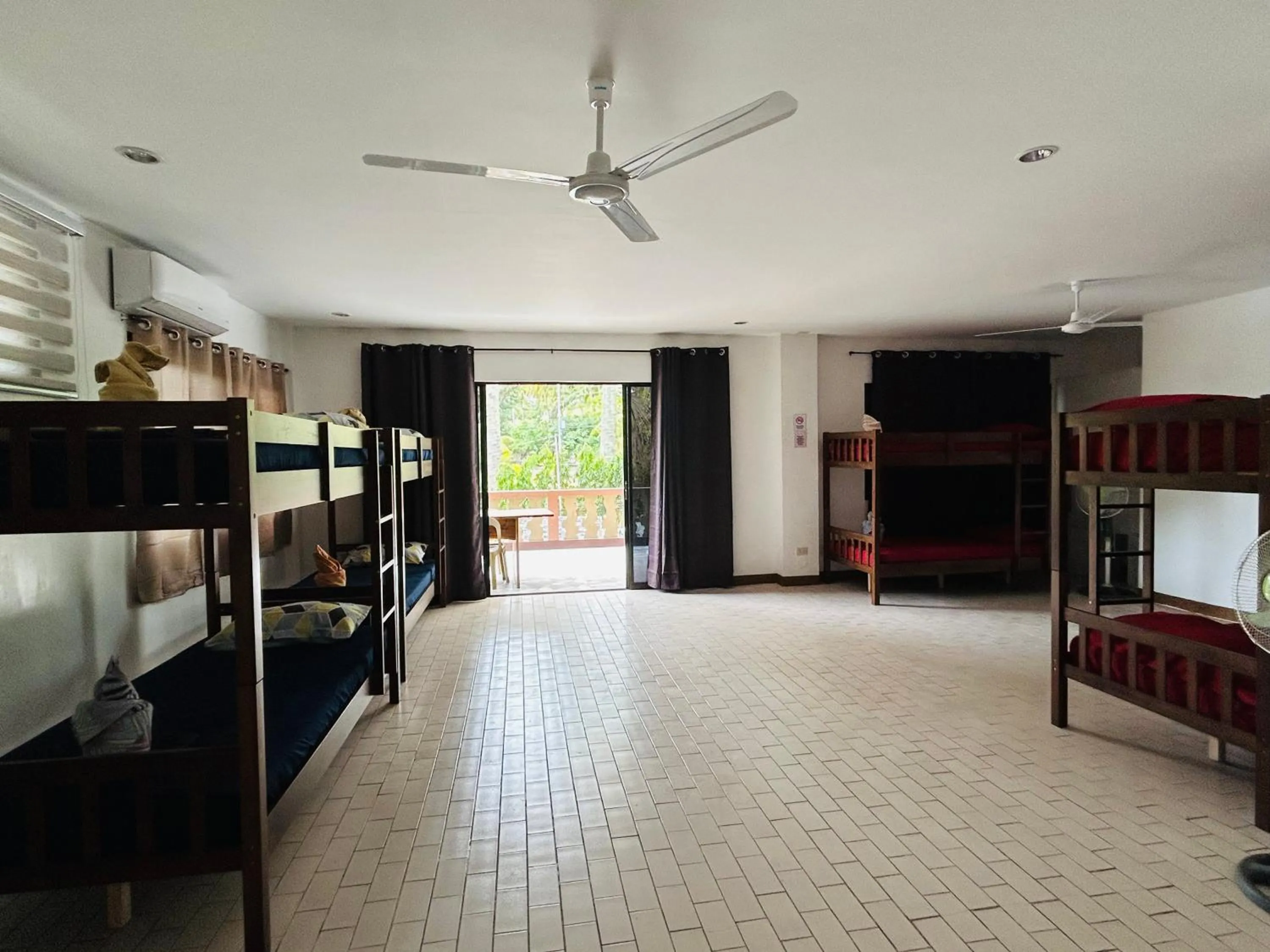 Bed in 1888 Beach Resort