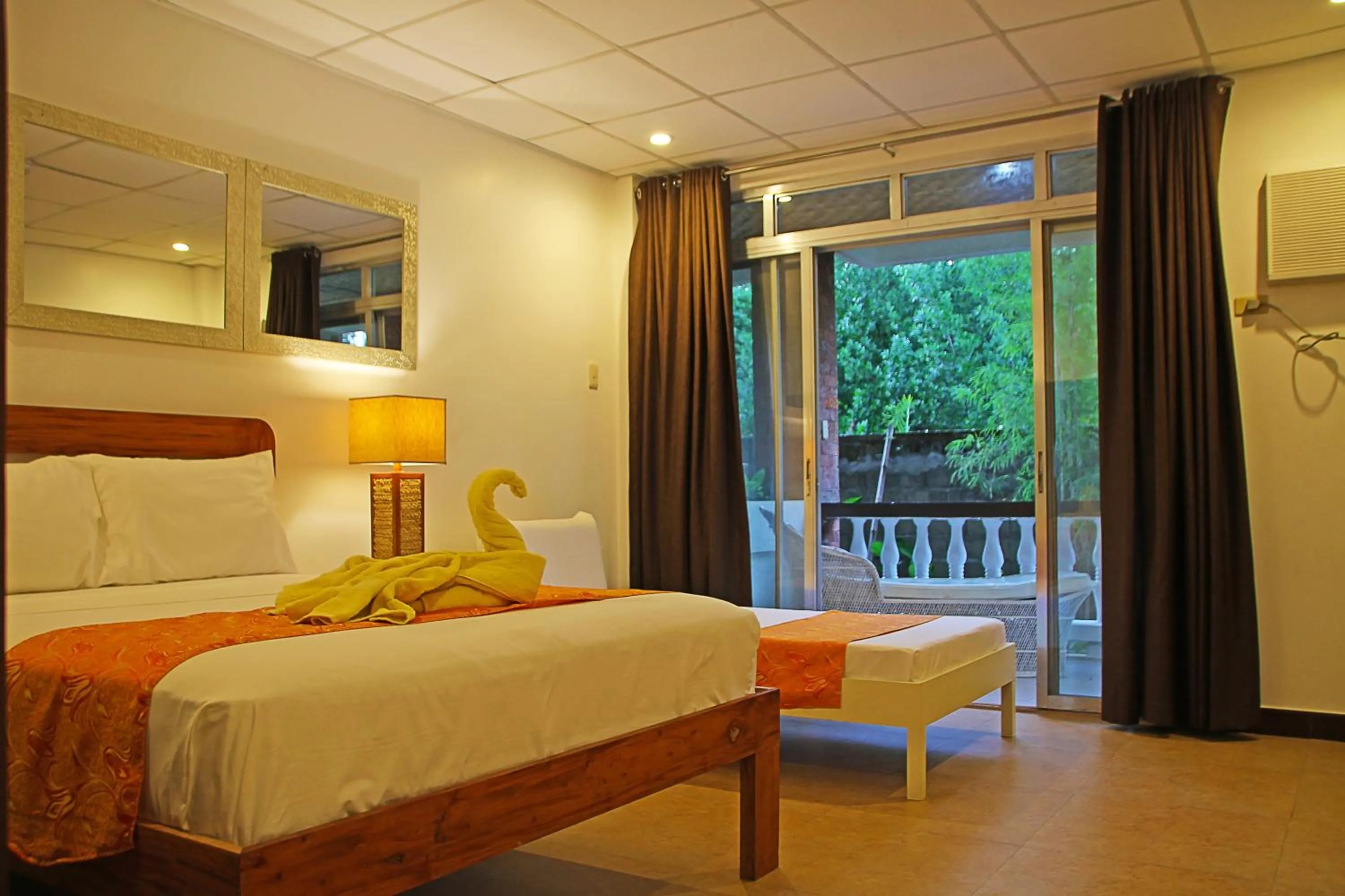 Bed in 1888 Beach Resort