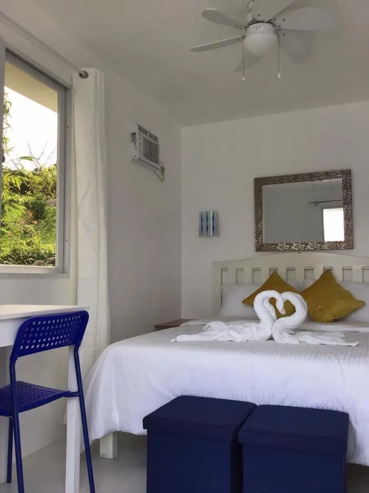 Bed in 1888 Beach Resort