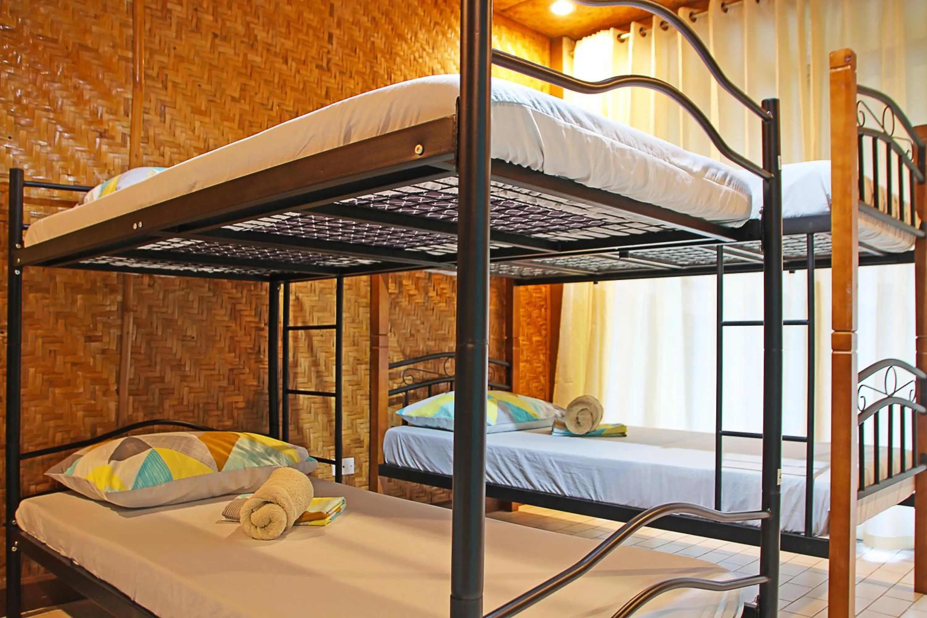 Bed in 1888 Beach Resort