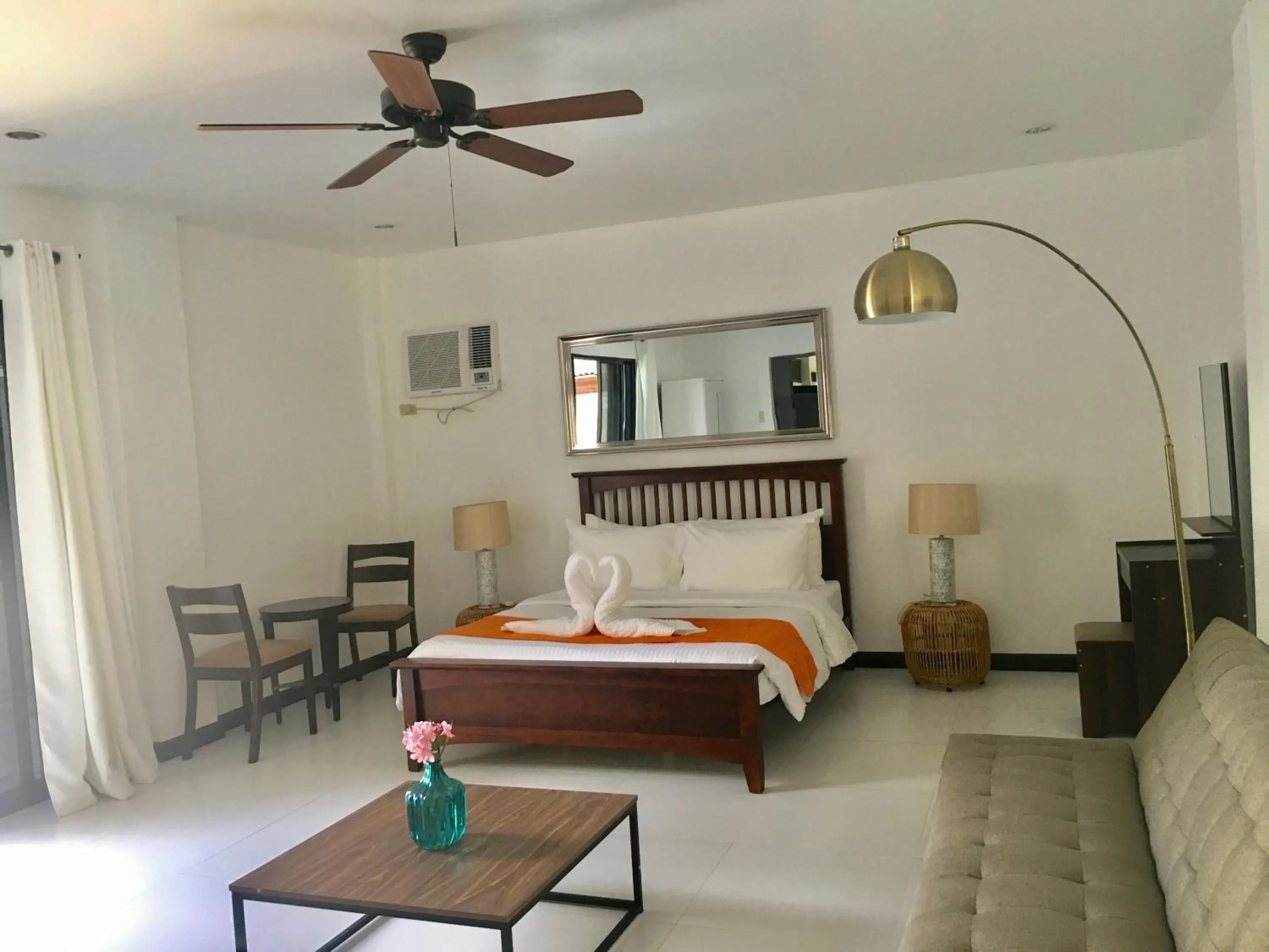 Bed in 1888 Beach Resort