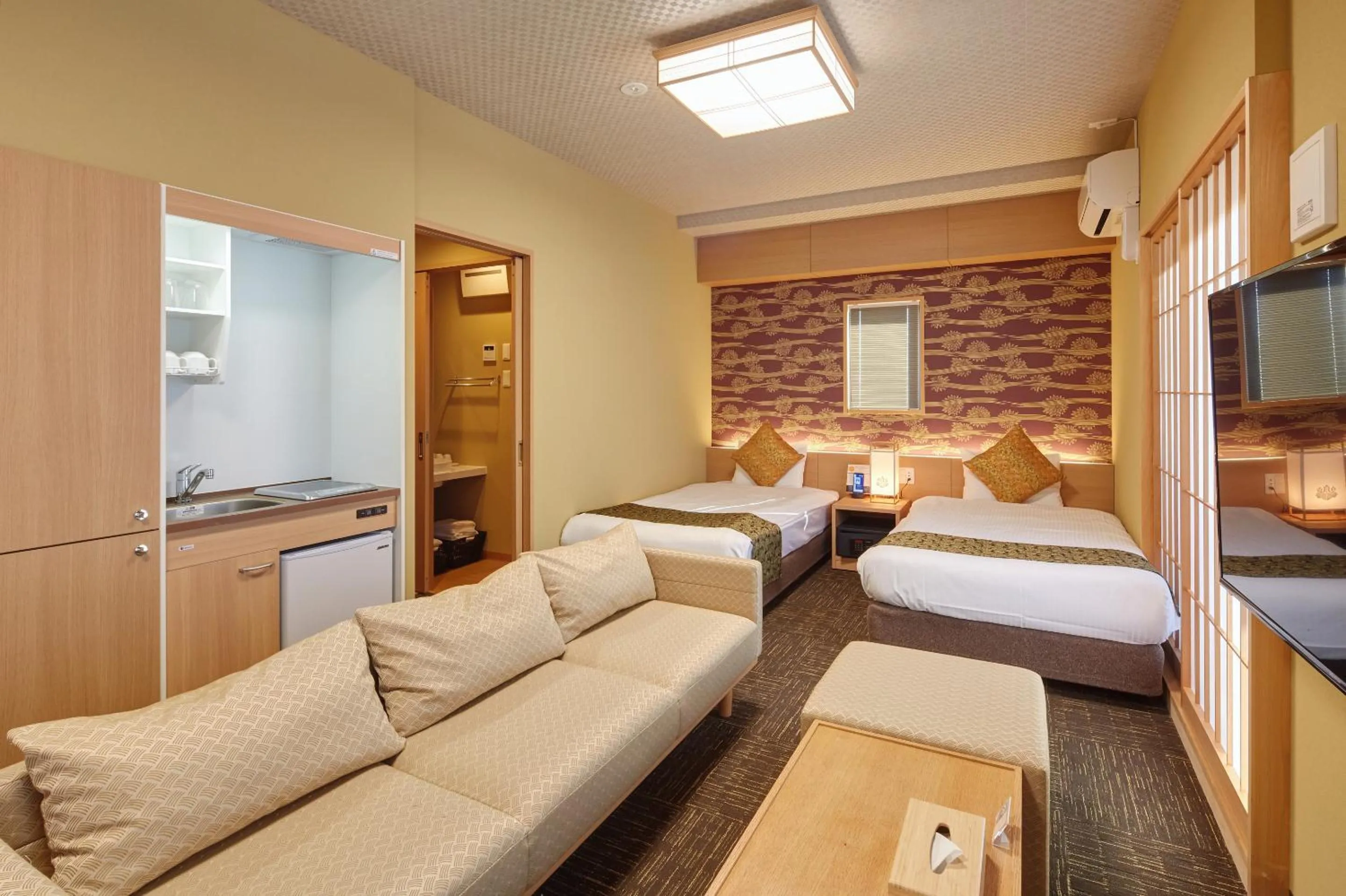 Living room, Bed in Hotel Amaterrace Nippombashi-higashi