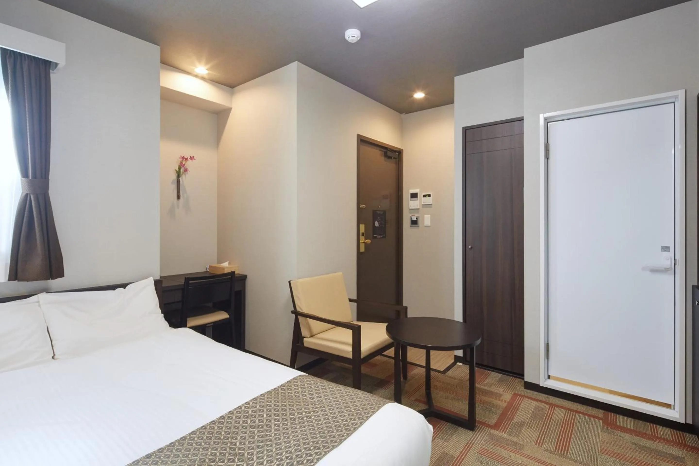 Living room, Bed in Hotel Amaterrace Nippombashi-higashi