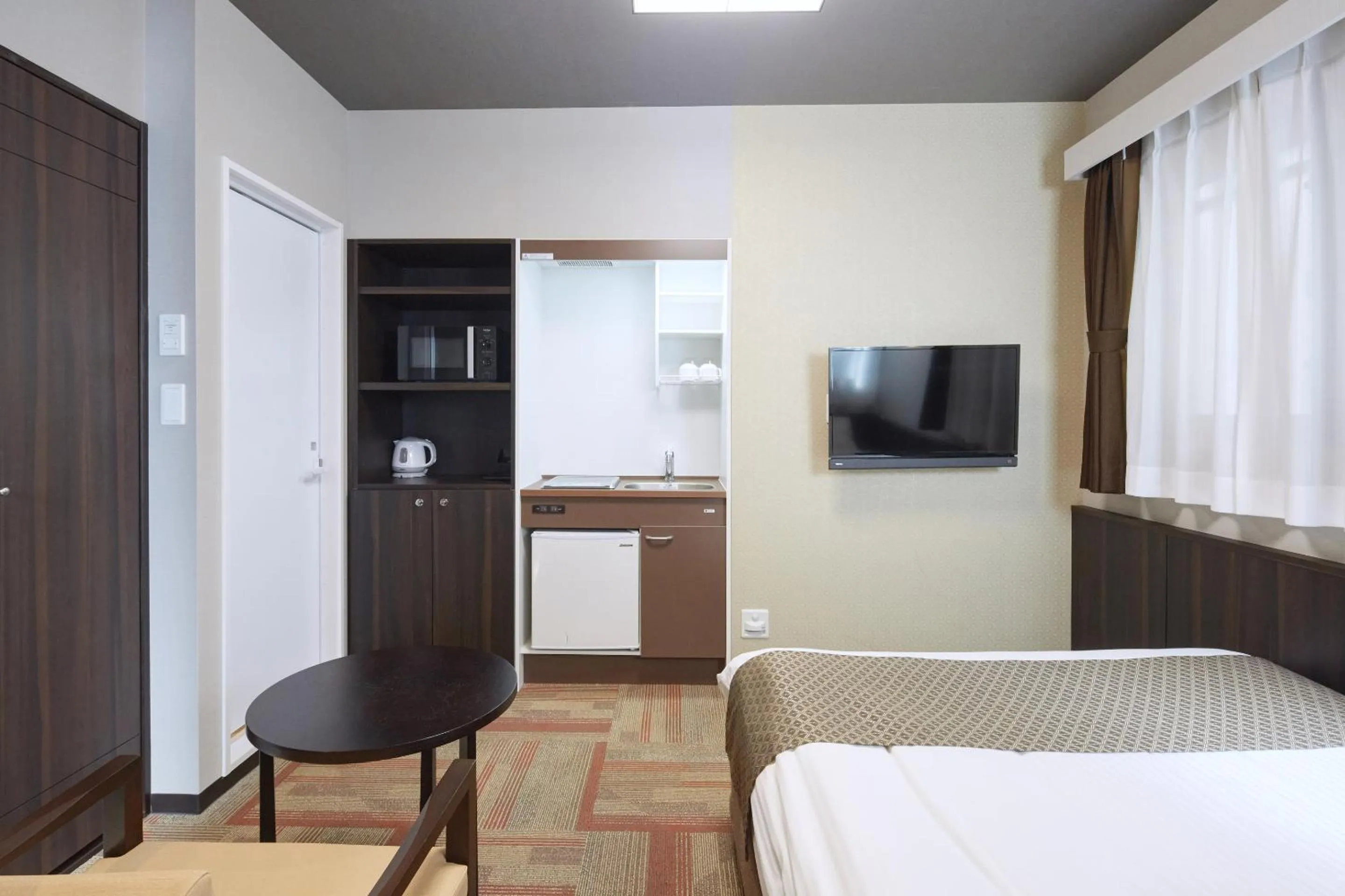 Kitchen or kitchenette, Bed in Hotel Amaterrace Nippombashi-higashi