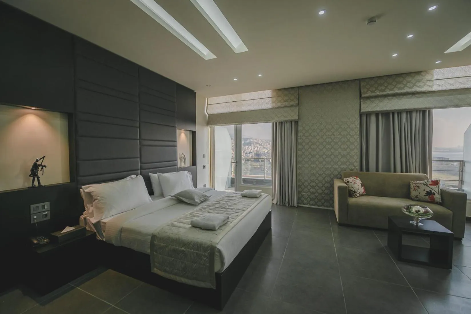 Living room, Bed in Louis V Hotel Beirut