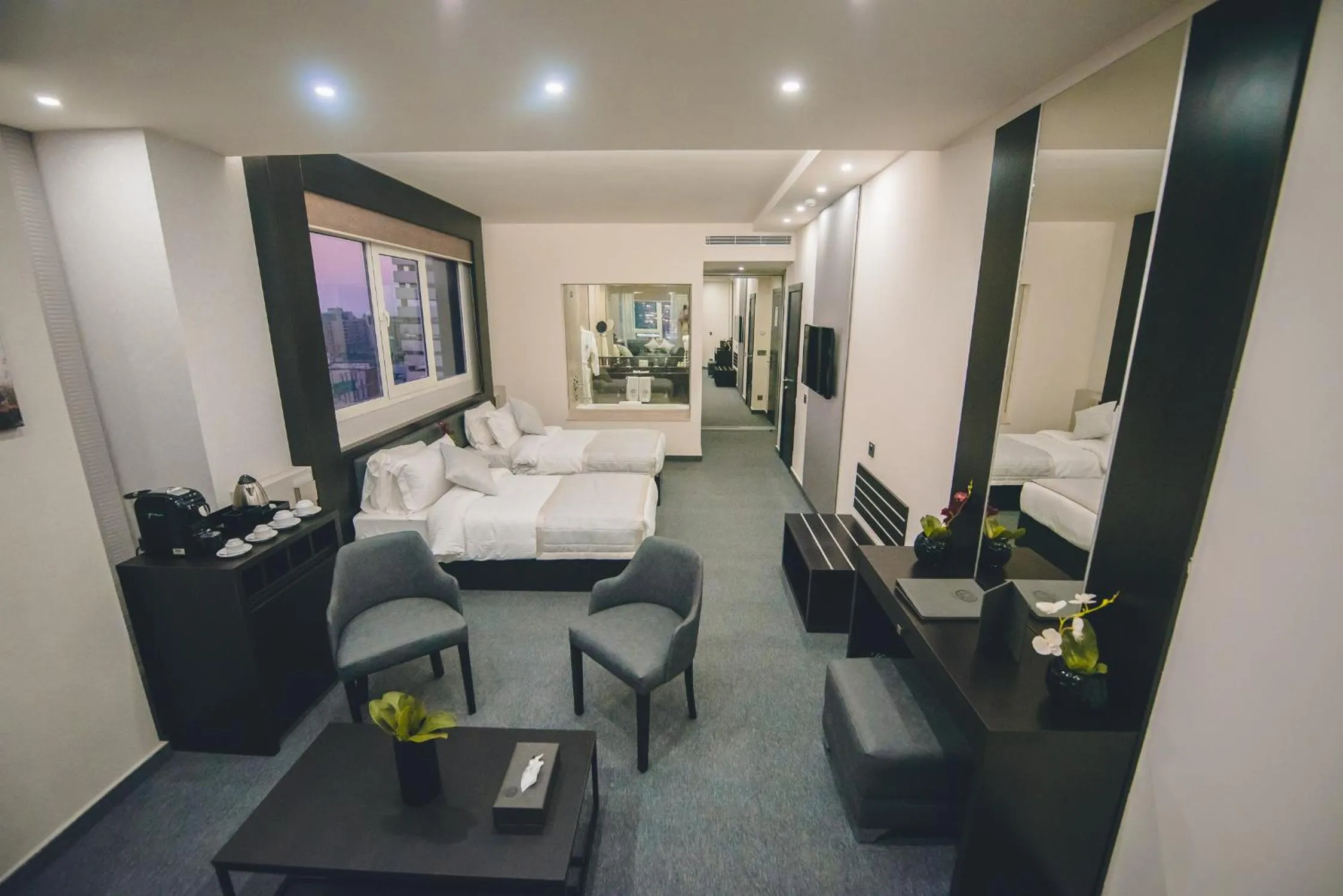 Living room, Bed in Louis V Hotel Beirut