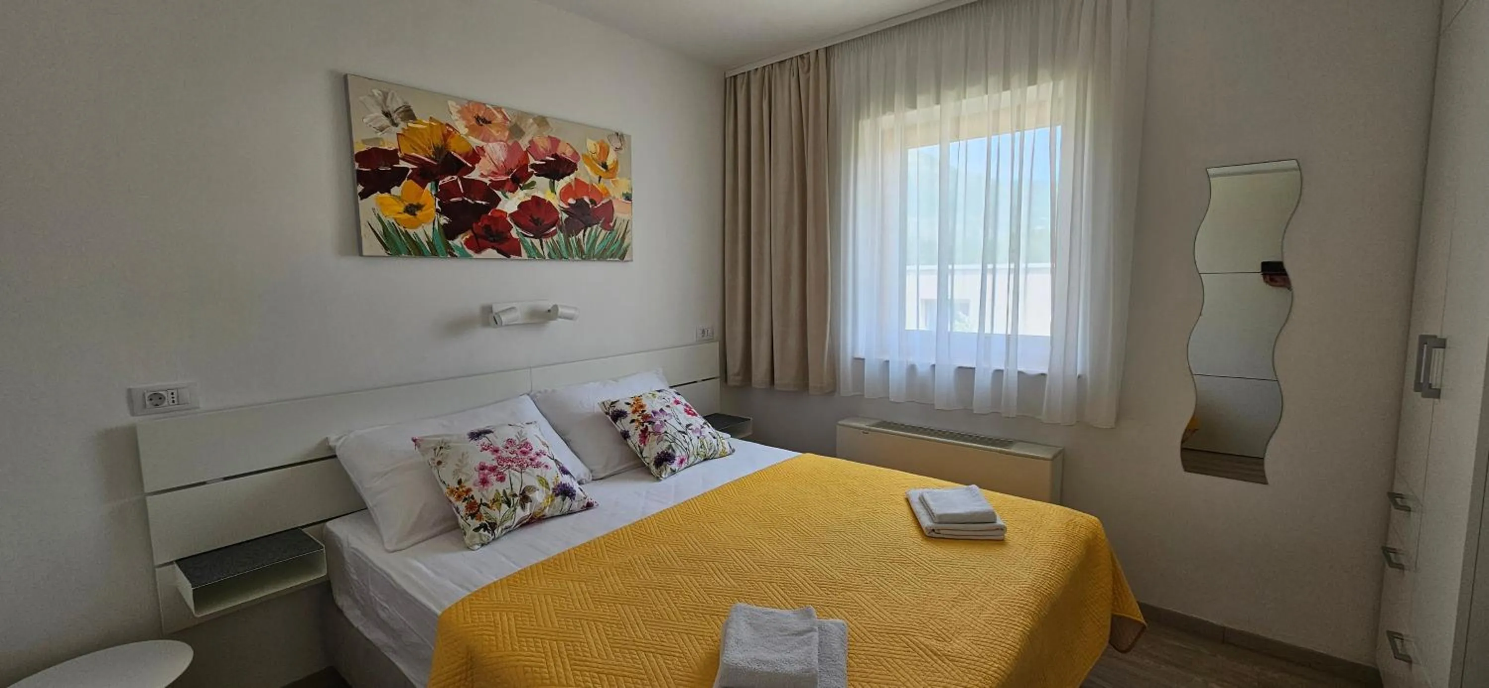 Bedroom in Cina Apartments