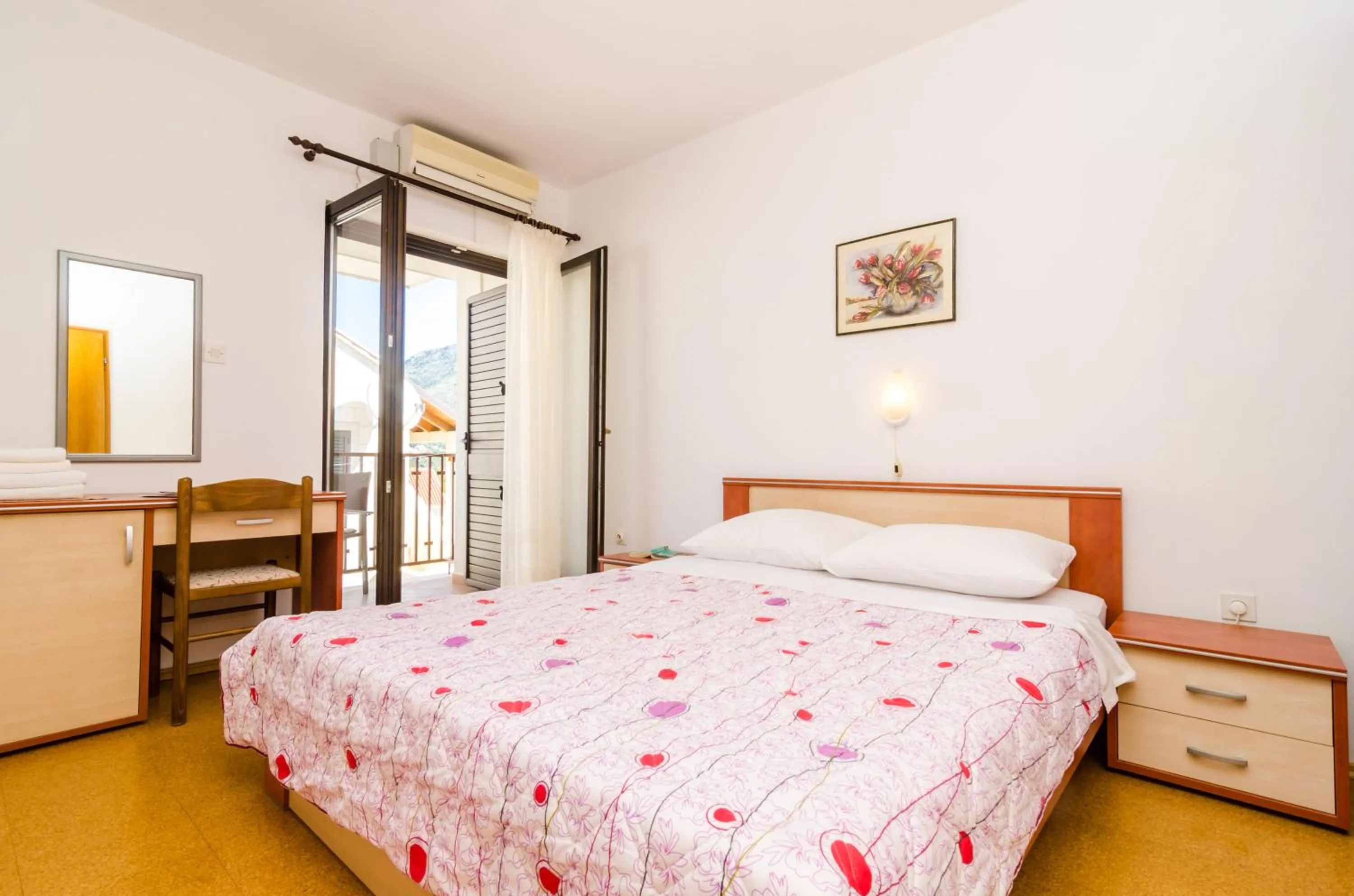 Bed in Cina Apartments