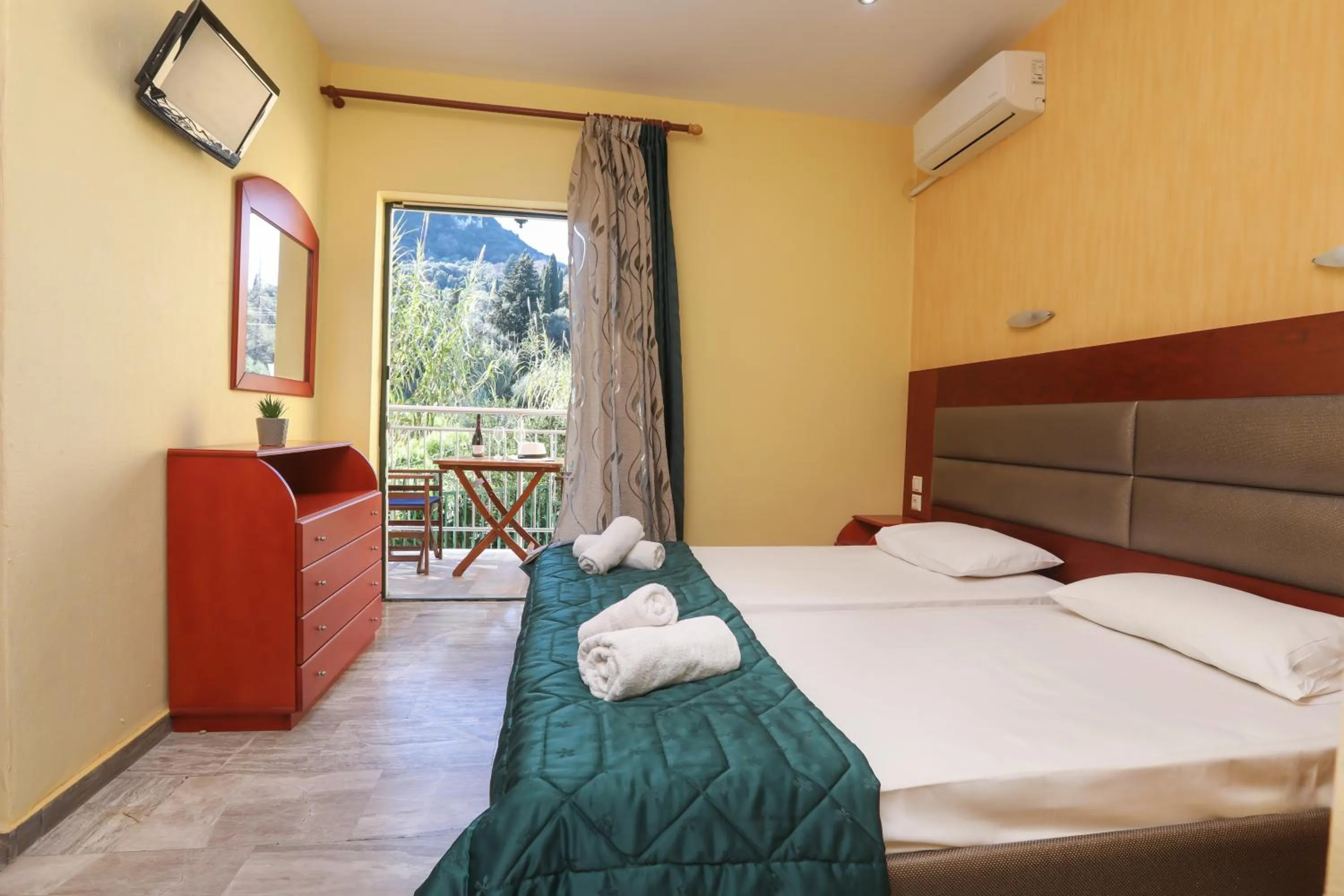 Bed in Kerkyra Studios & Apartments