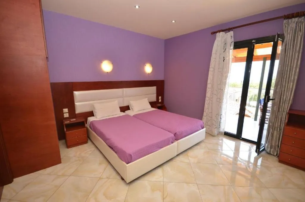 Bed in Kerkyra Studios & Apartments