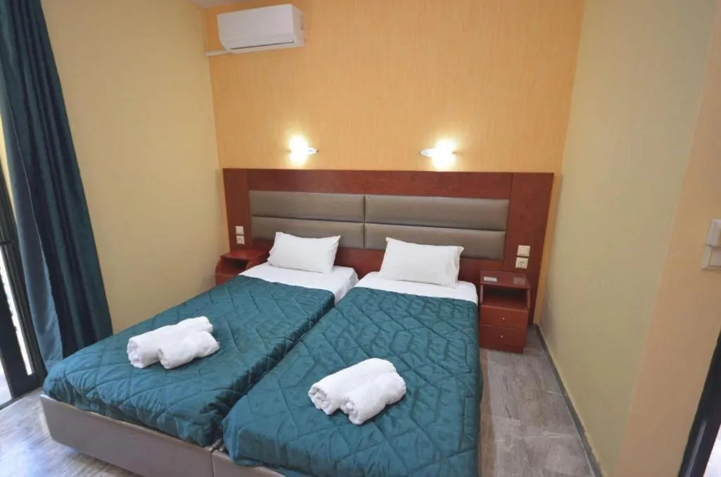 Bed in Kerkyra Studios & Apartments