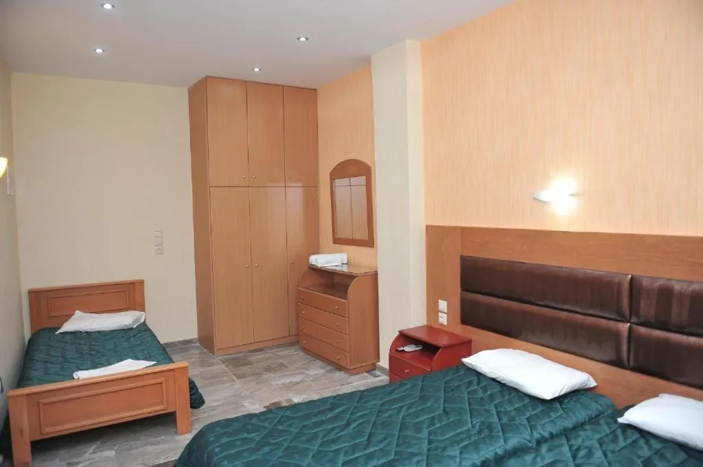 Bed in Kerkyra Studios & Apartments