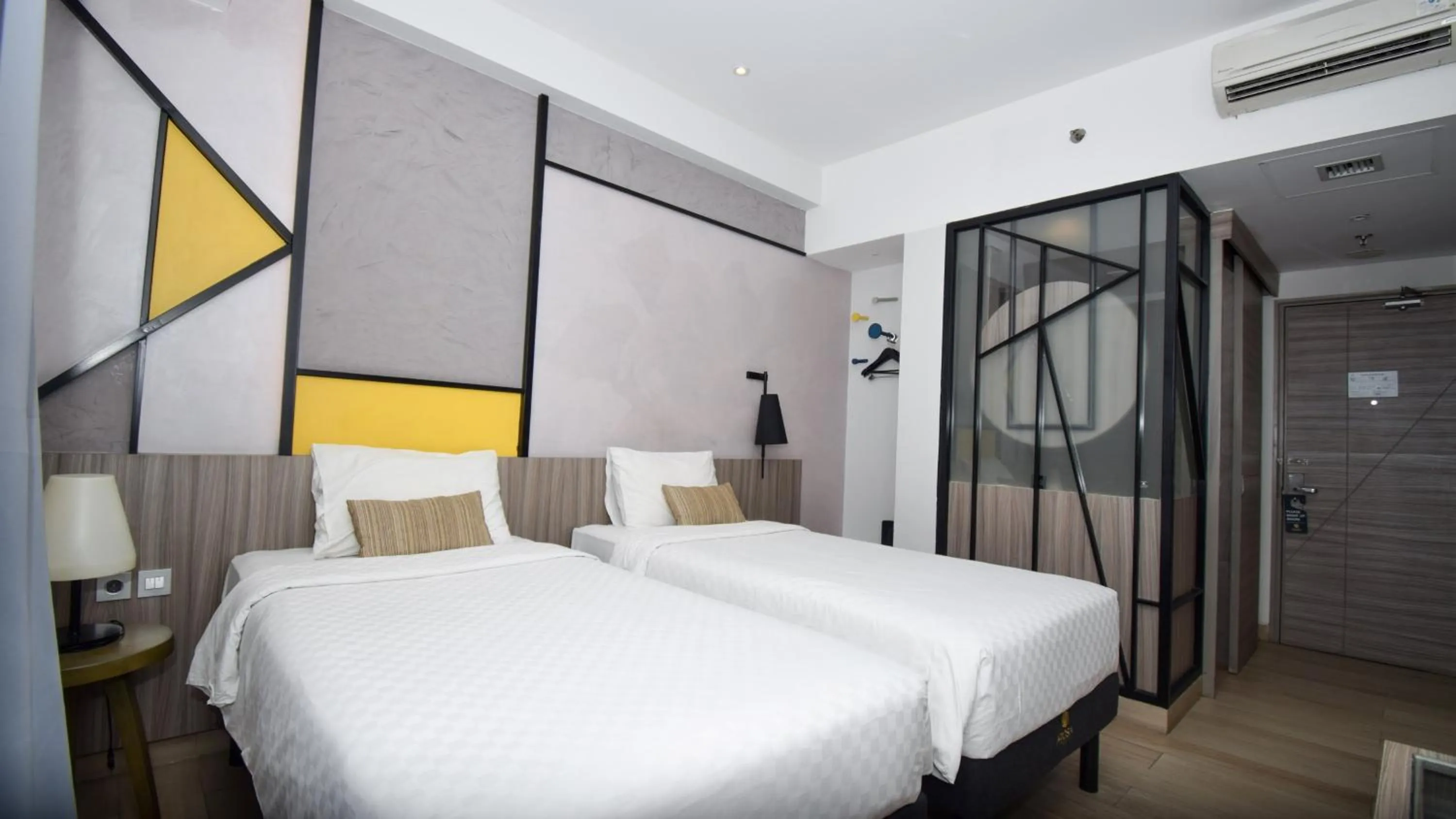 Bed in Arosa Hotel Jakarta