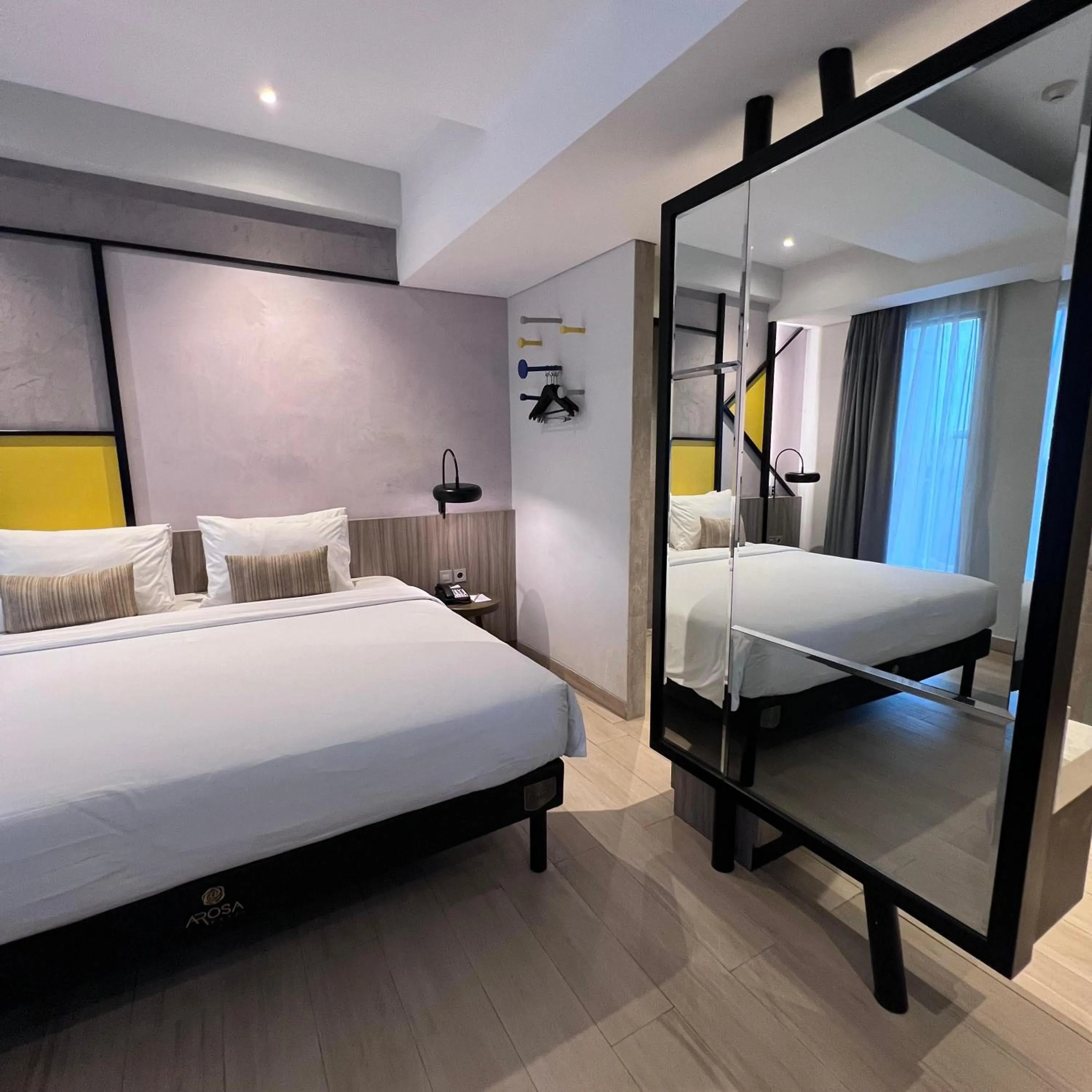 Bed in Arosa Hotel Jakarta