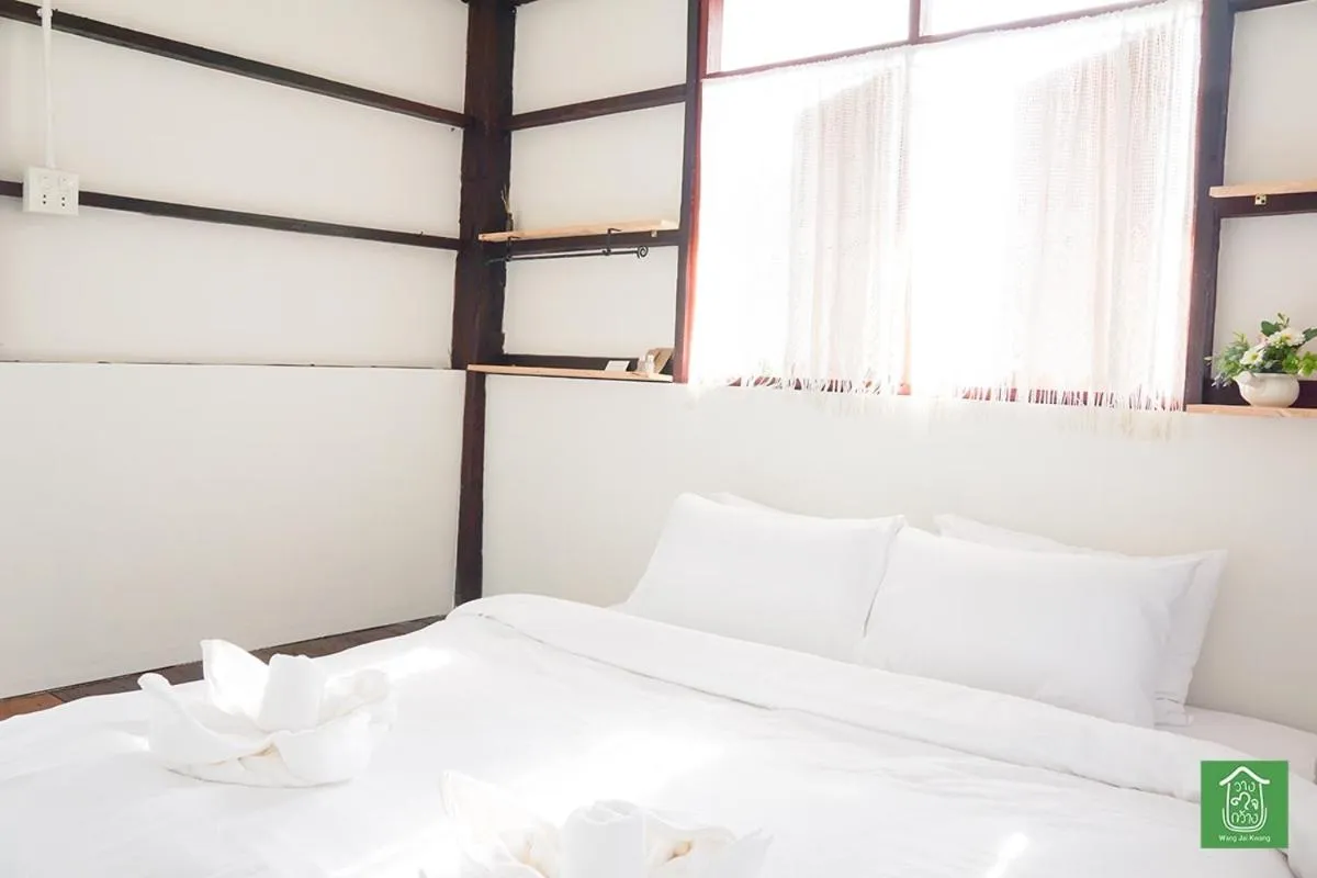 Bed in Wang Jai Kwang Space Inn