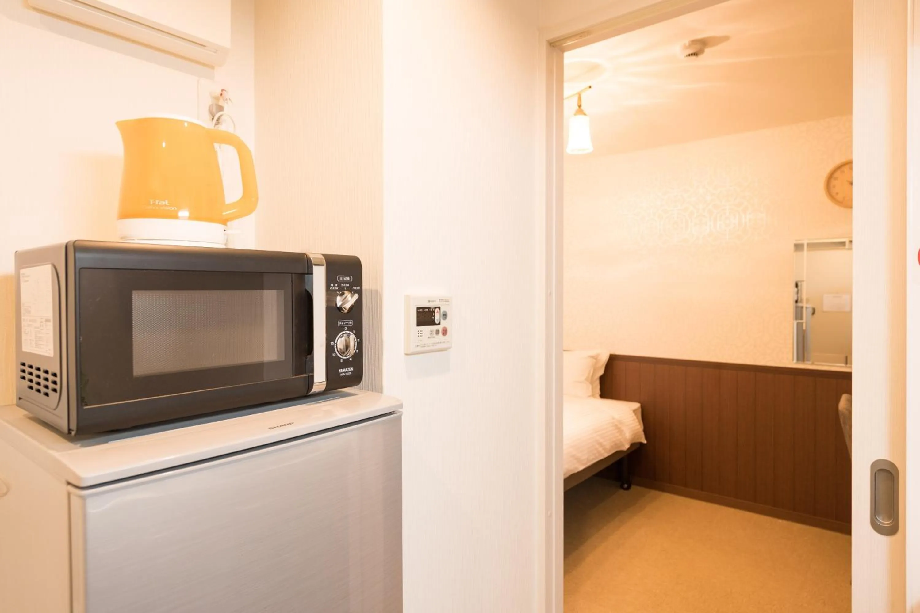 minibar, Bed in Floral Green Maple House