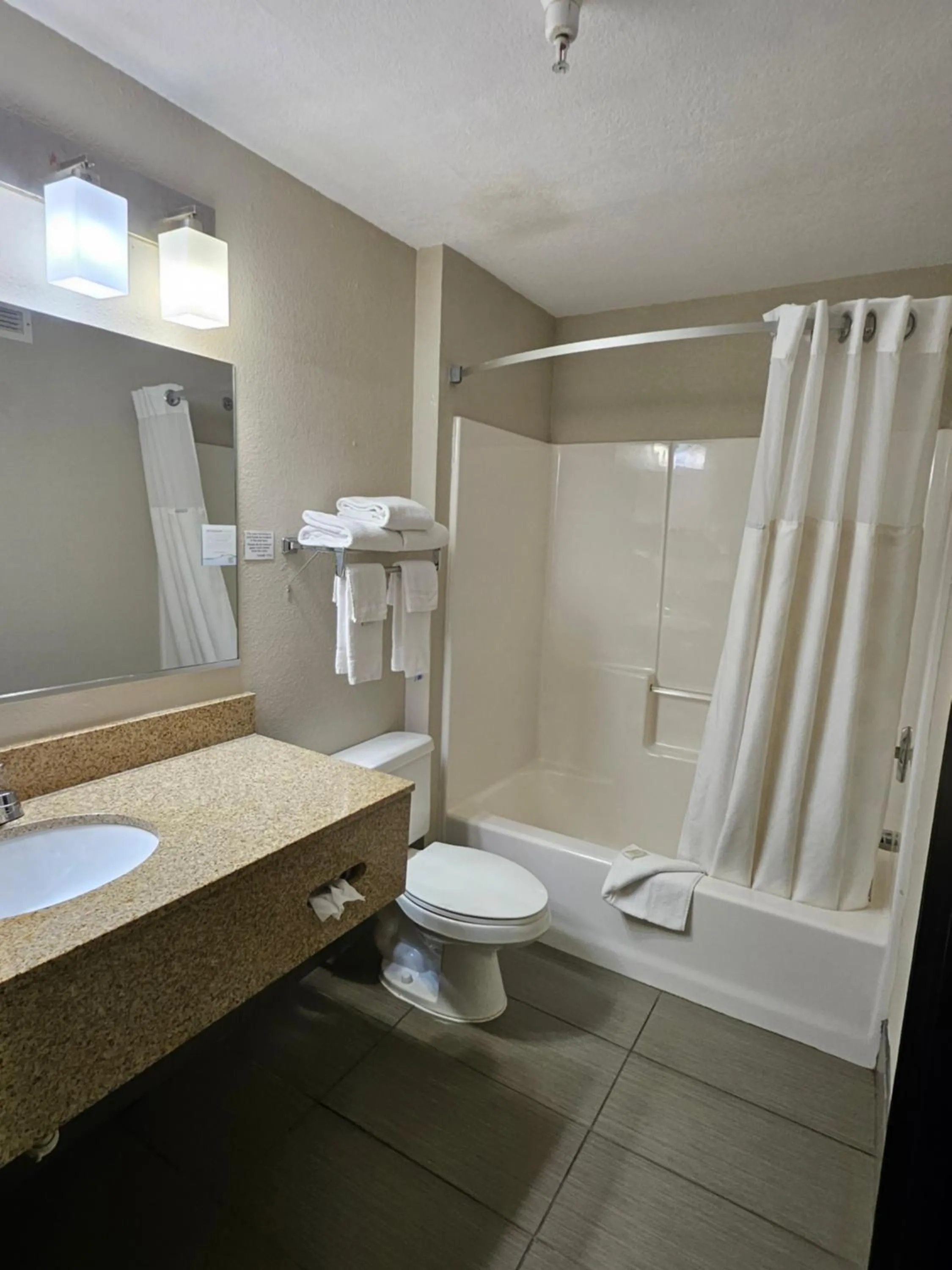 Toilet in Ramada by Wyndham Platte City KCI Airport