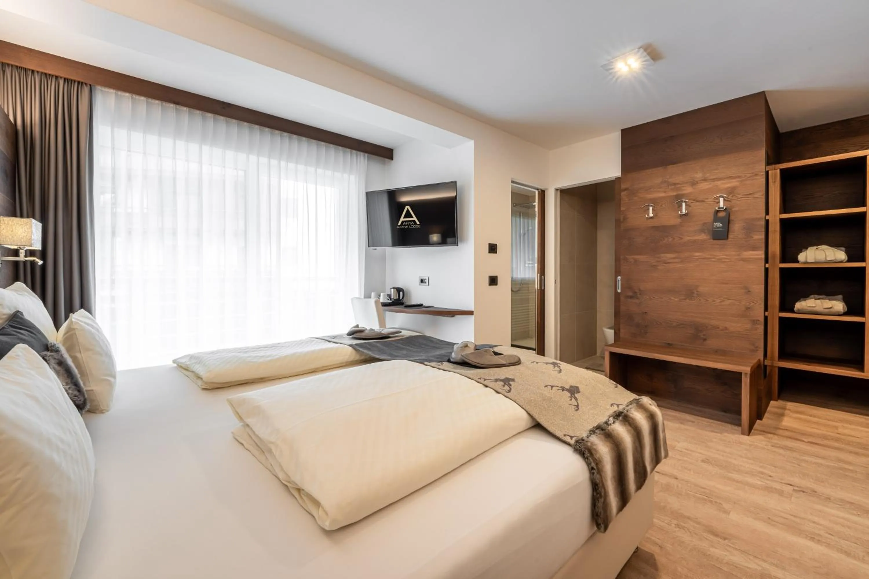 Bed in Arya Alpine Lodge