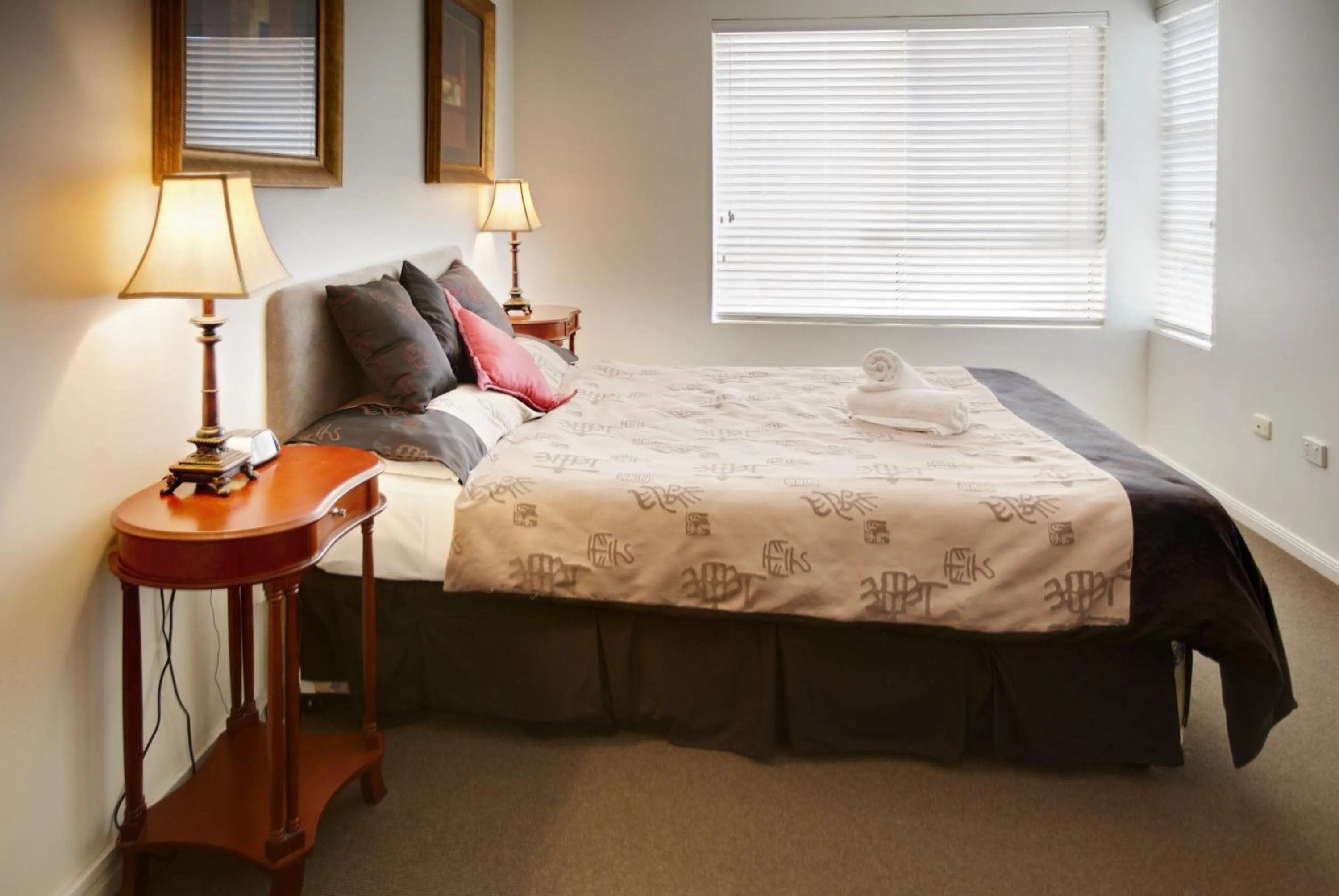 Bed in On The River Apartments