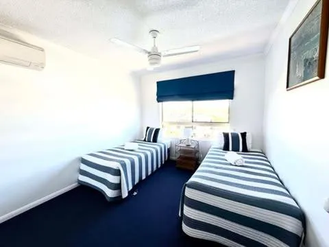 Bed in On The River Apartments