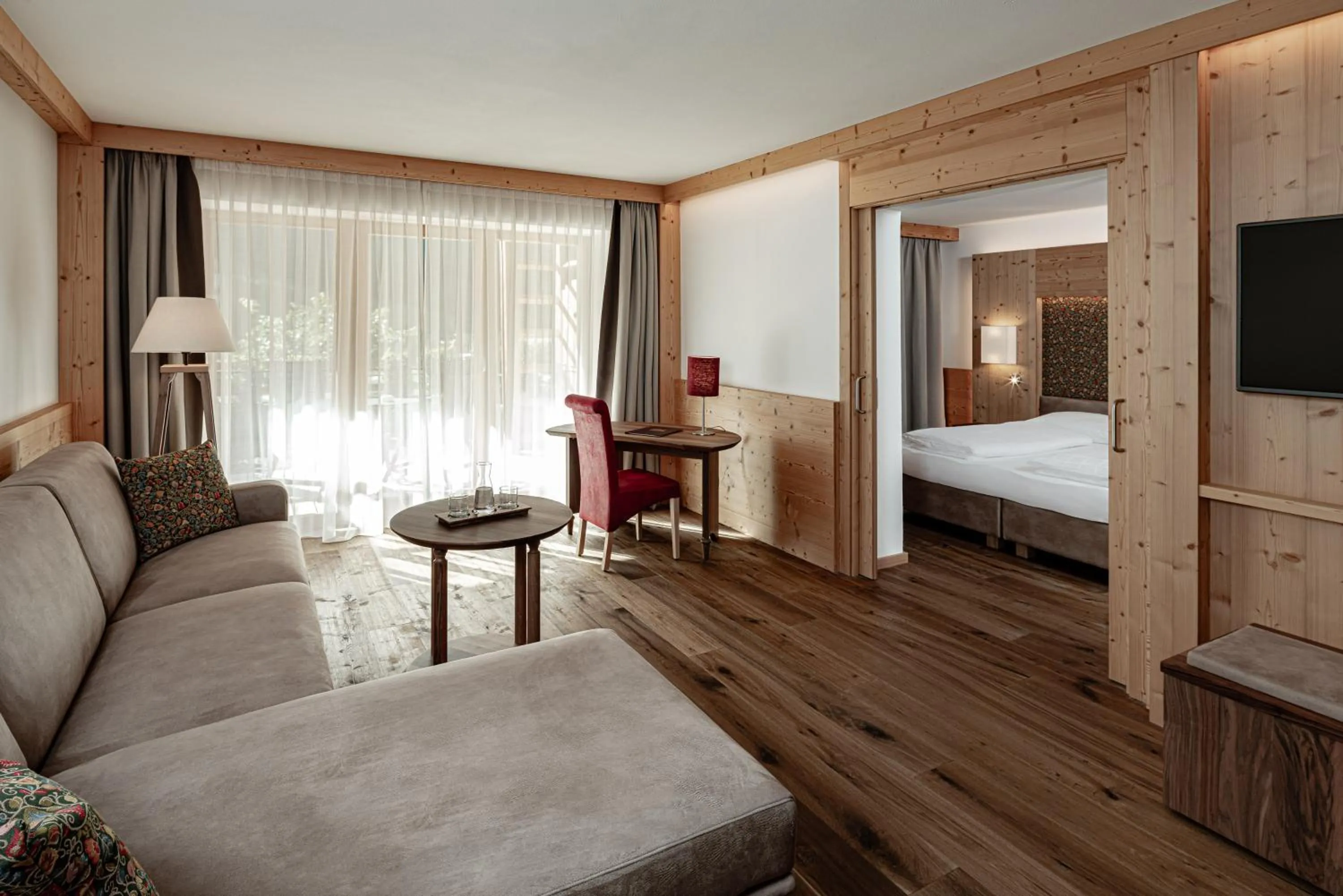 Living room, Bed in Hotel Masl