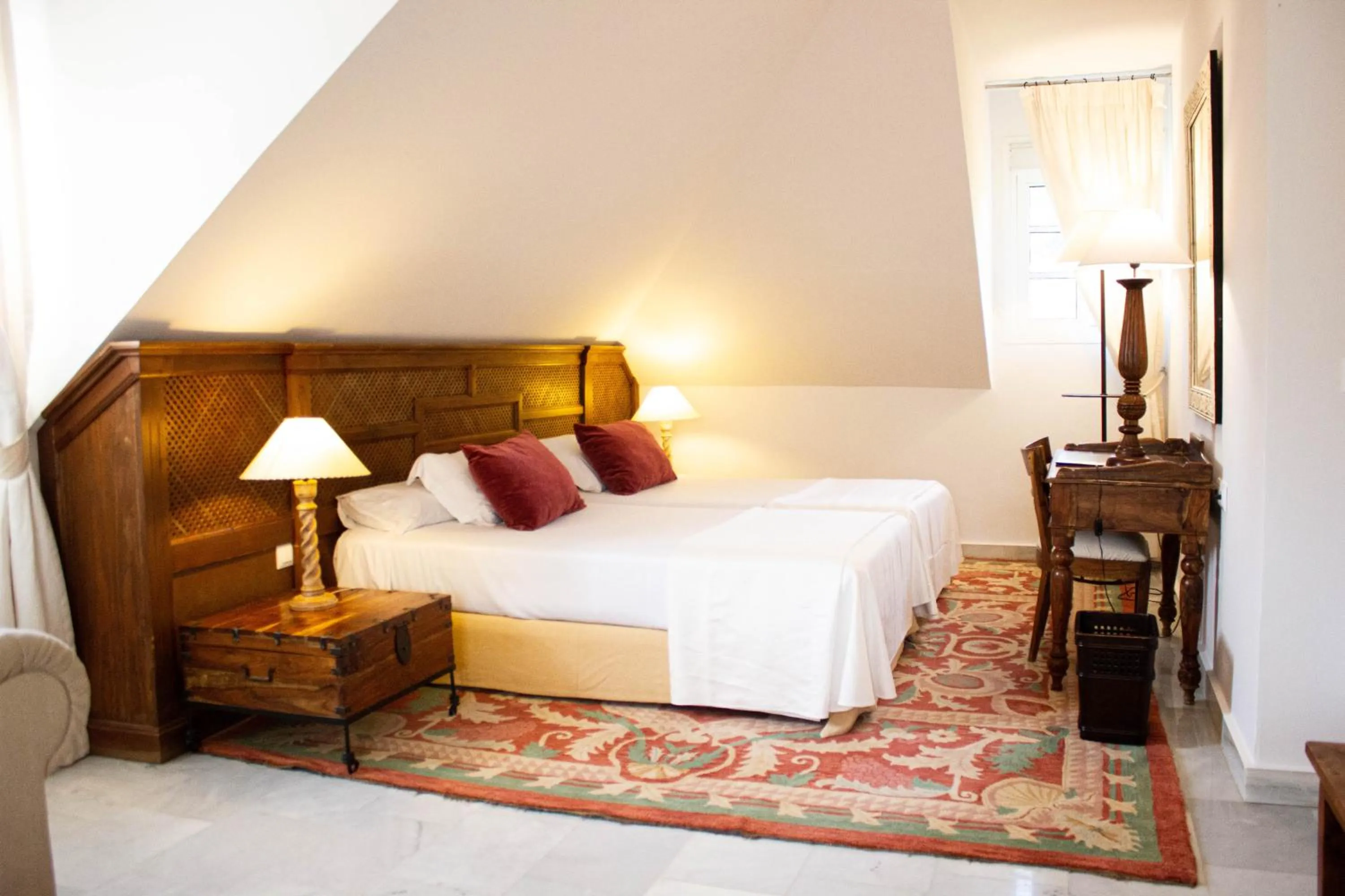 Bed in Hotel Hacienda Montenmedio