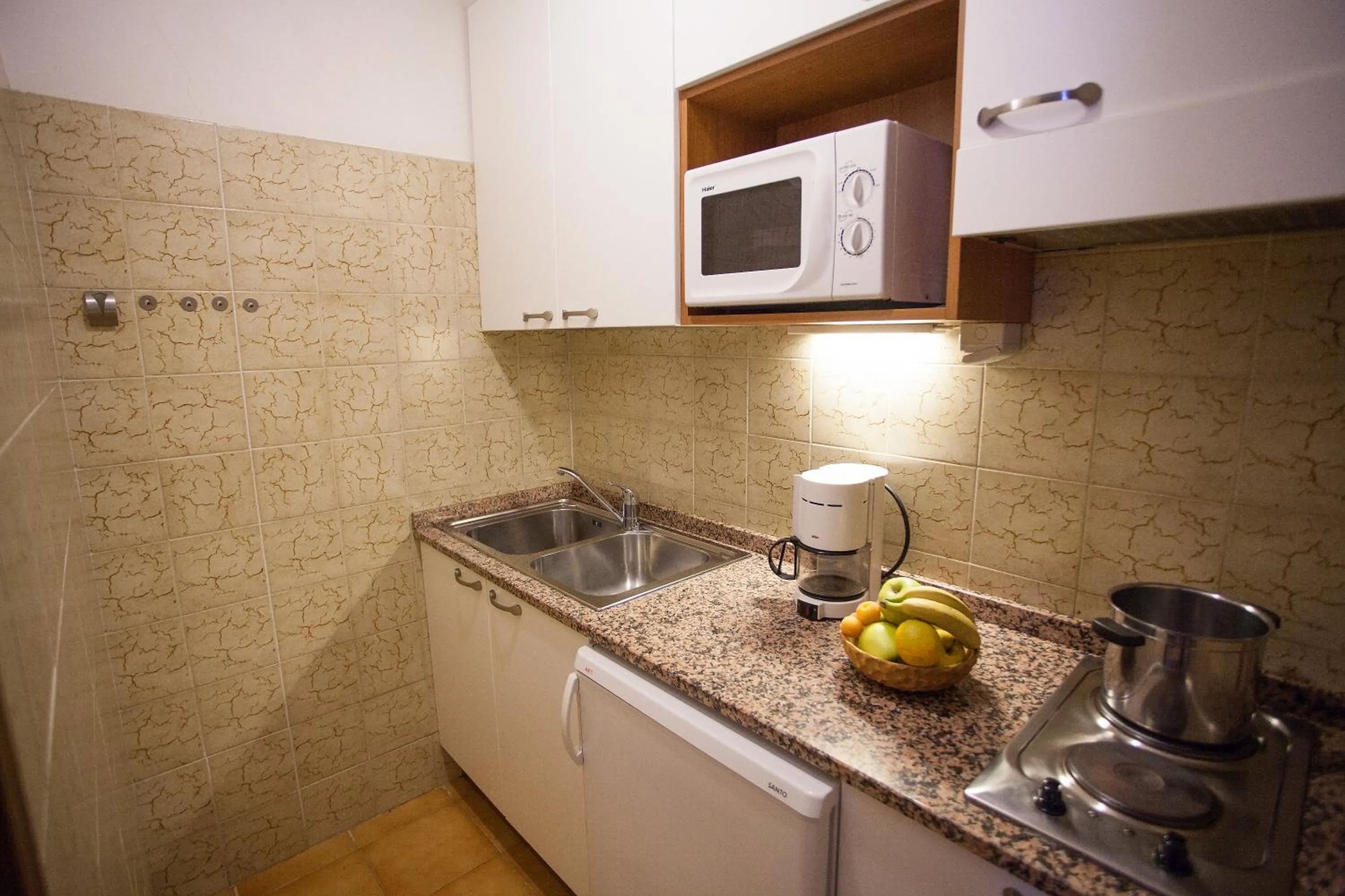 Kitchen or kitchenette in Hotel Garnì Villa Magnolia