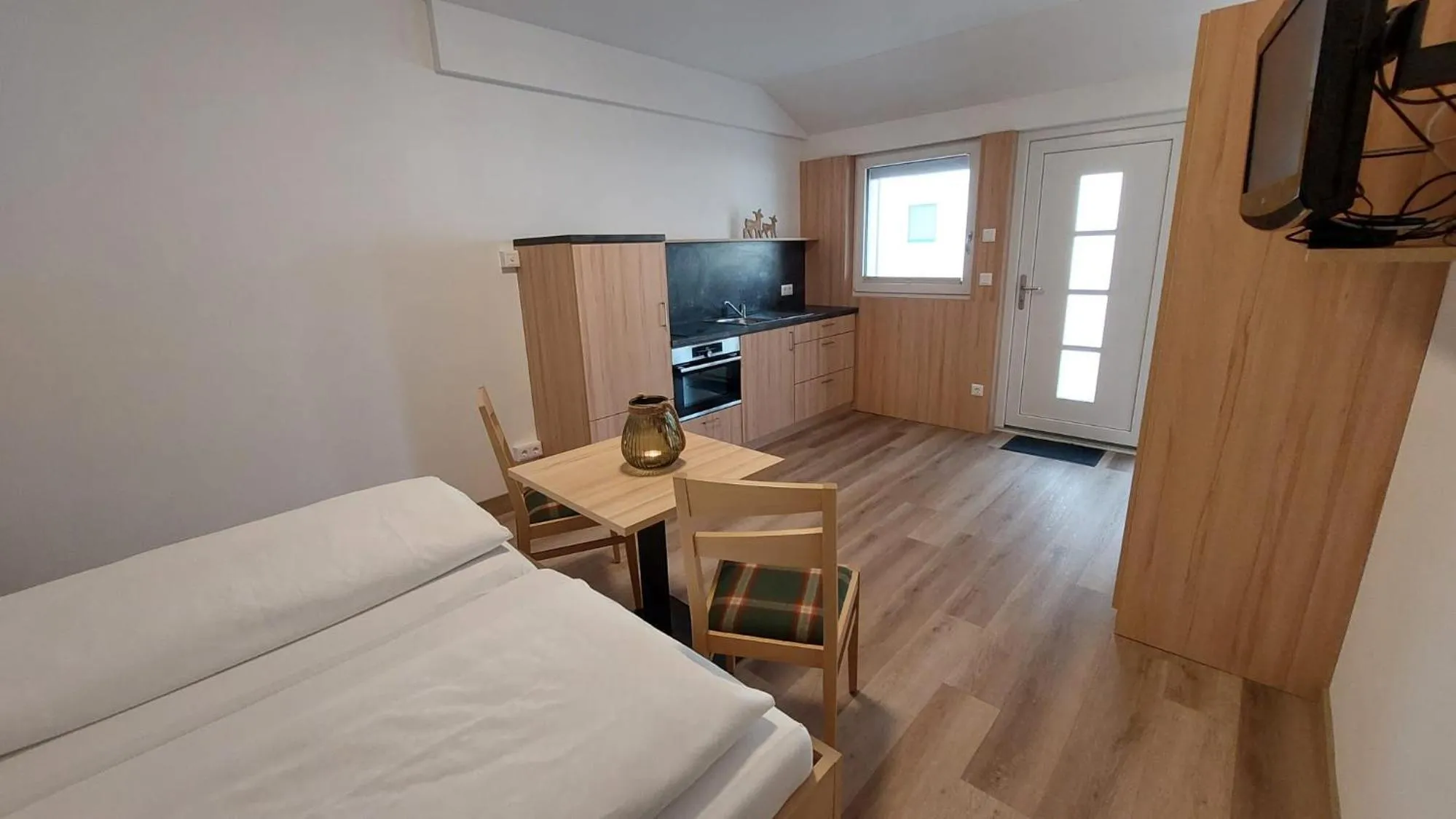 Bed in Landhotel Häuserl im Wald