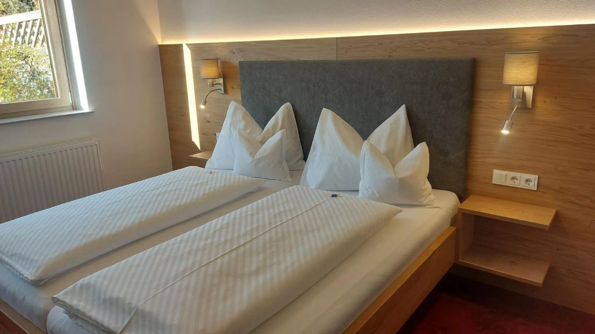 Bed in Landhotel Häuserl im Wald