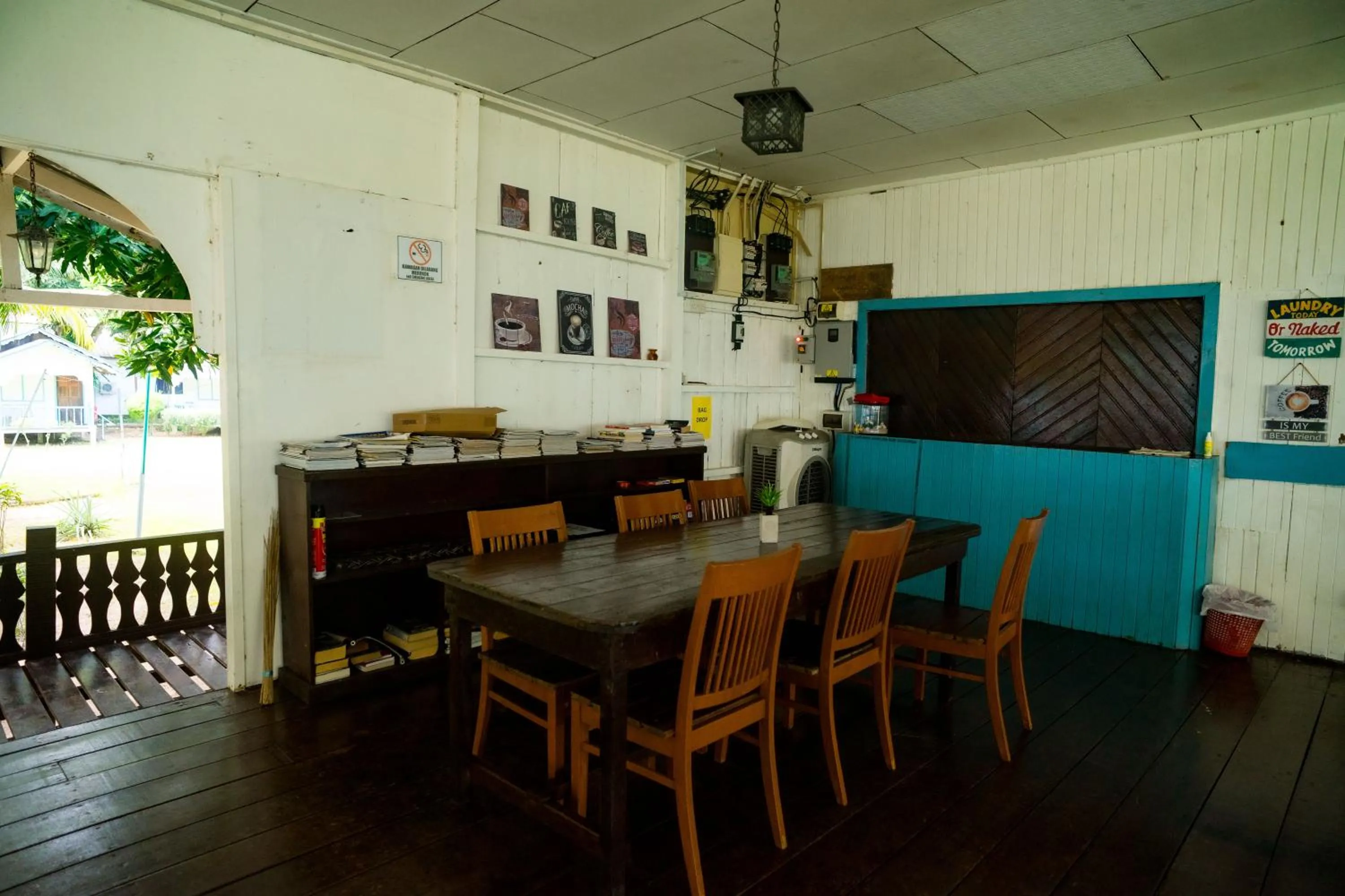 Communal lounge/ TV room in Impian Inn