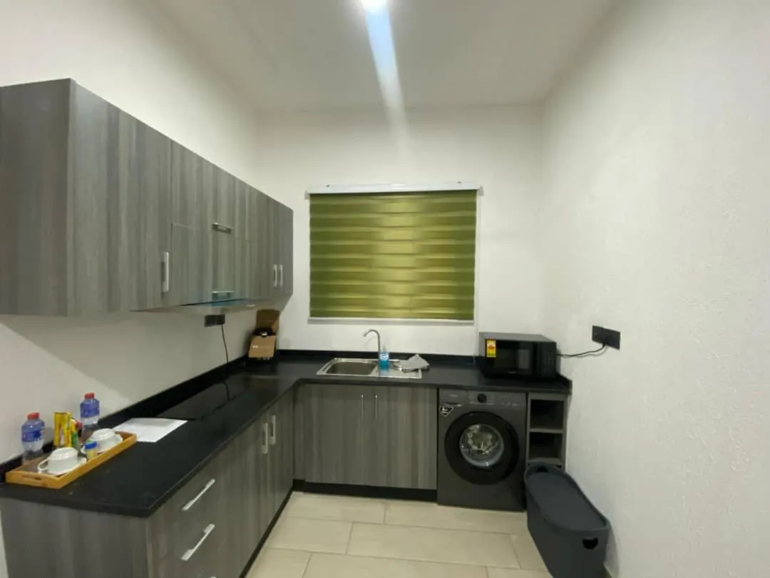 Kitchen or kitchenette in PLUS 33 HOTEL