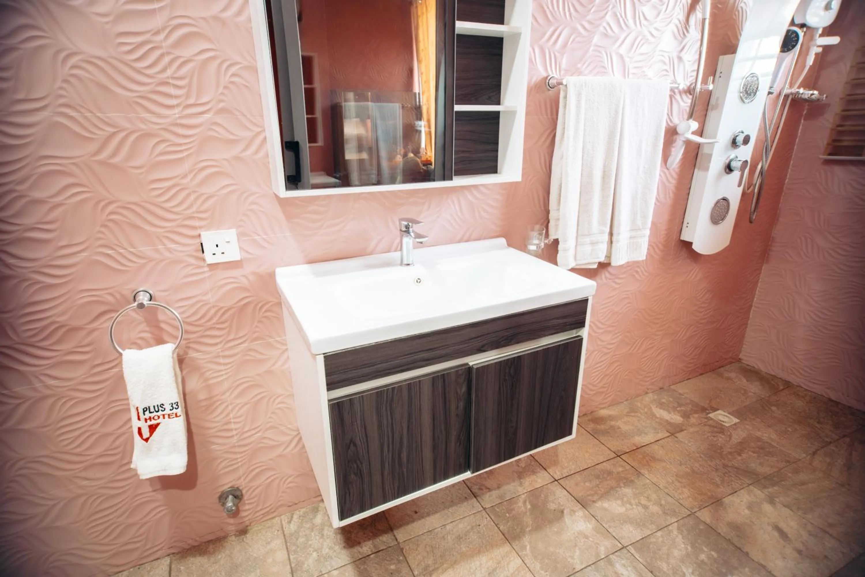 Bathroom in PLUS 33 HOTEL