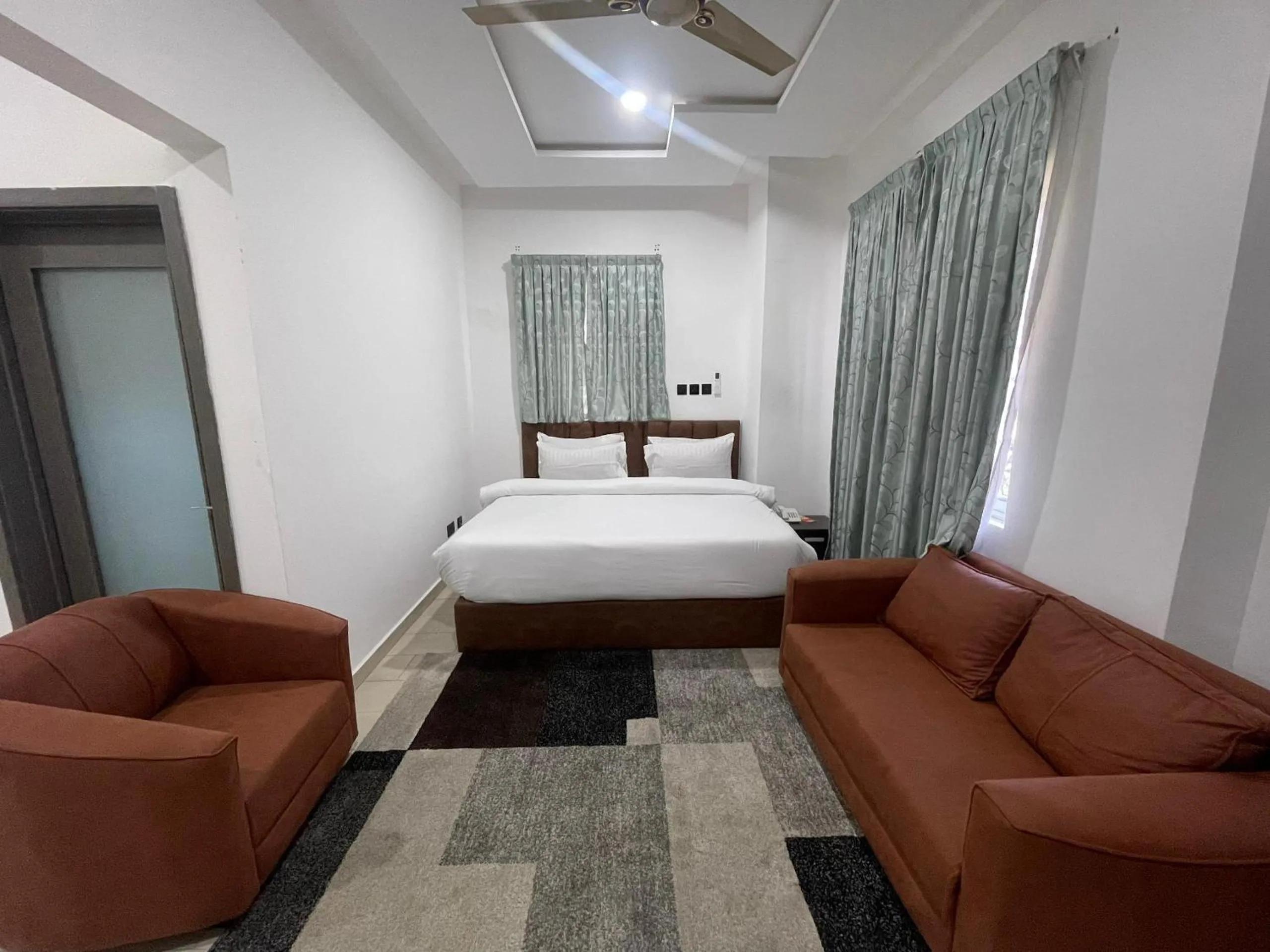 Bed in PLUS 33 HOTEL