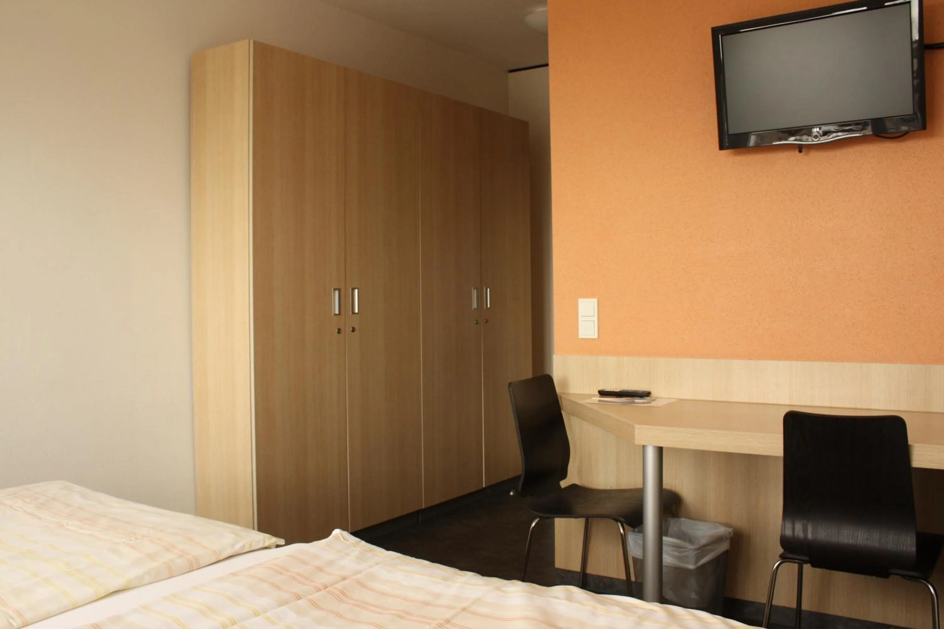 Bed in Hotel Grand Tour