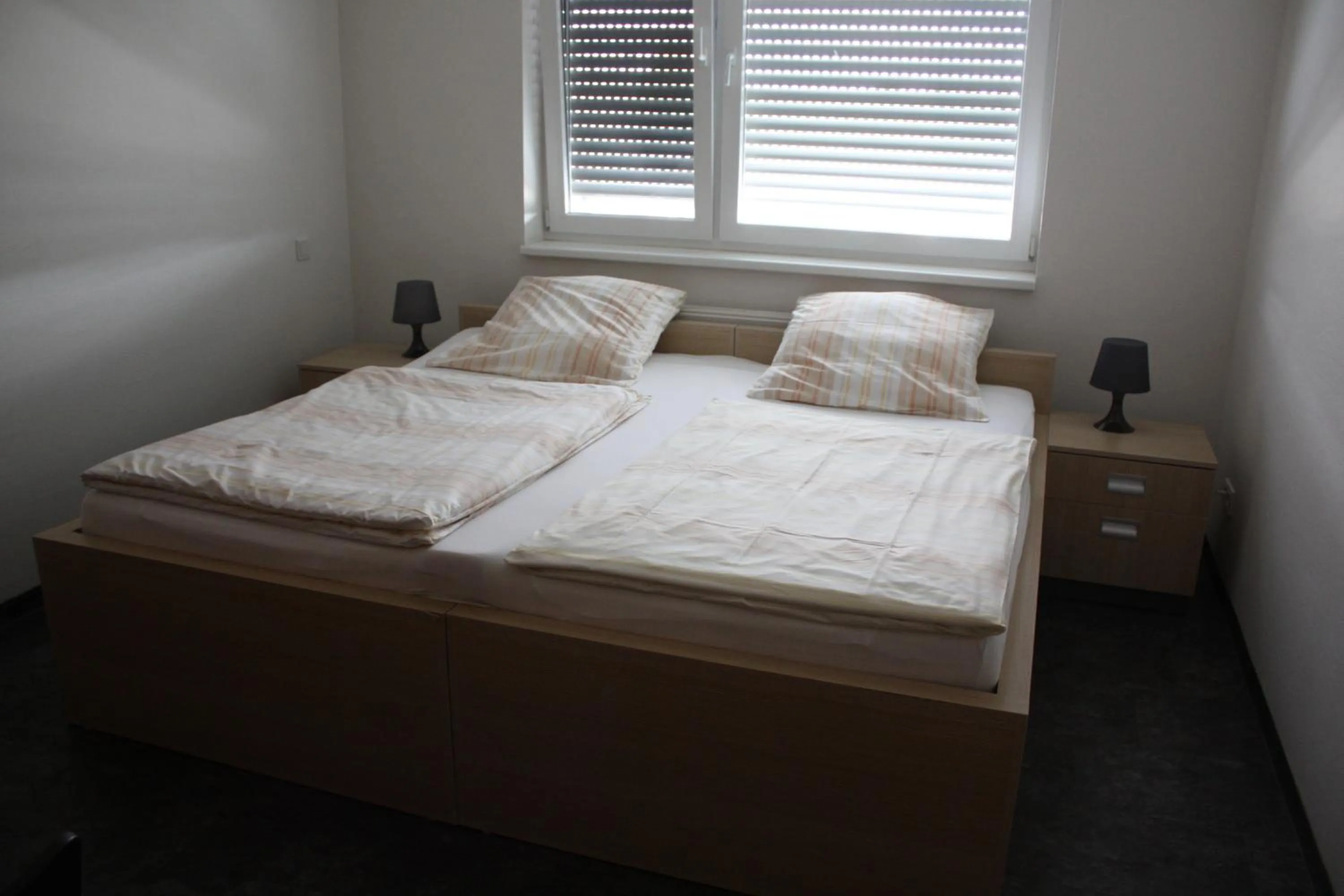 Bed in Hotel Grand Tour