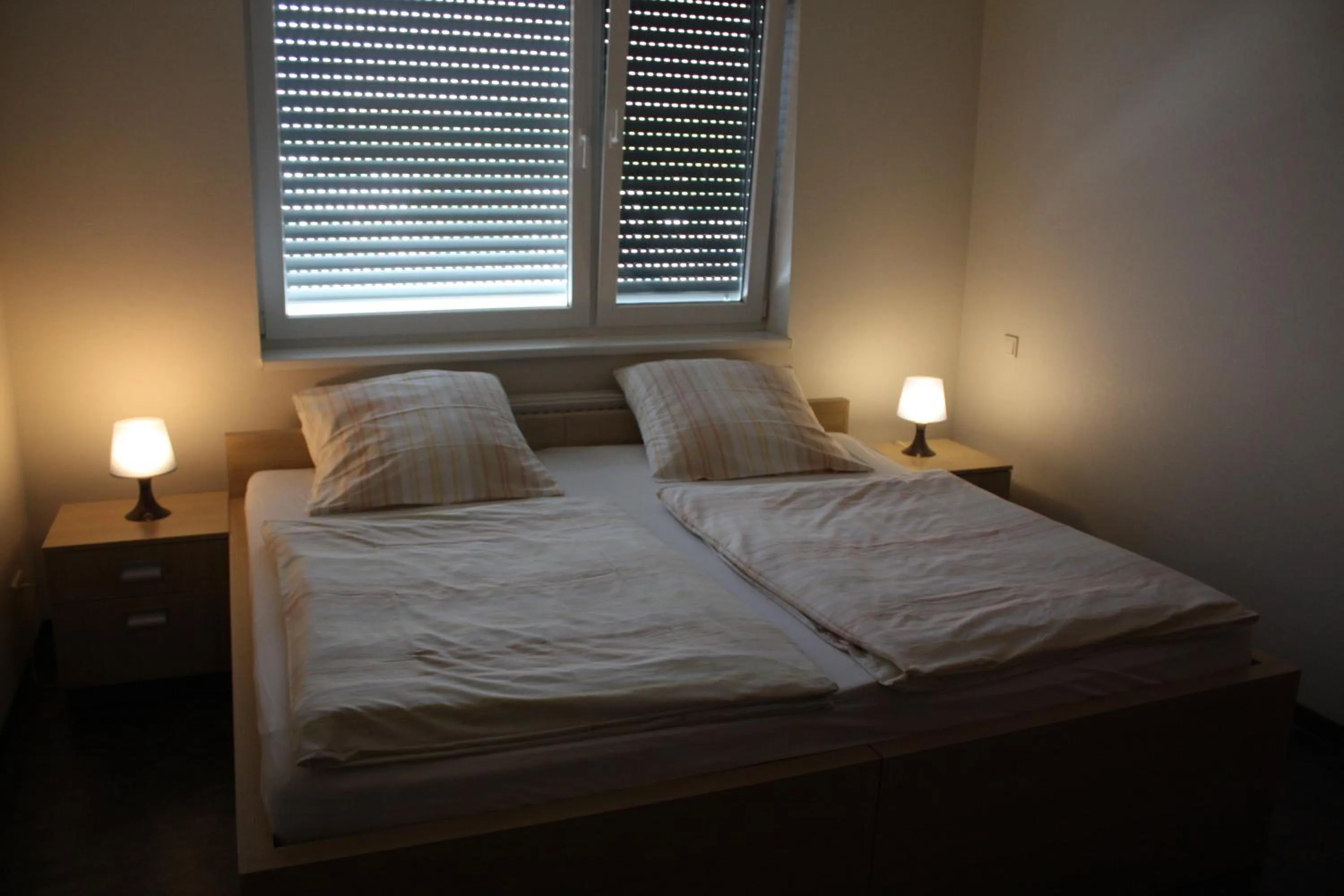 Bed in Hotel Grand Tour