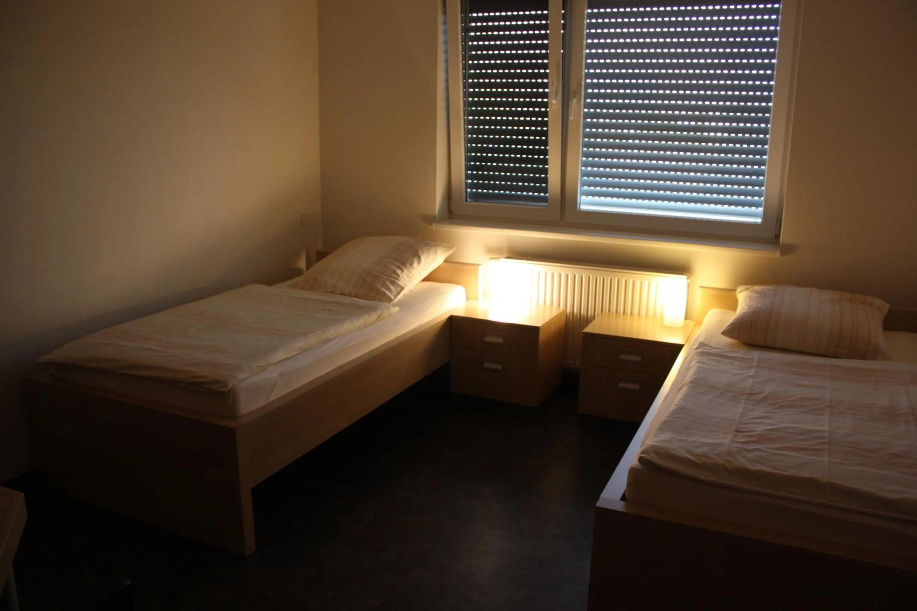 Bed in Hotel Grand Tour