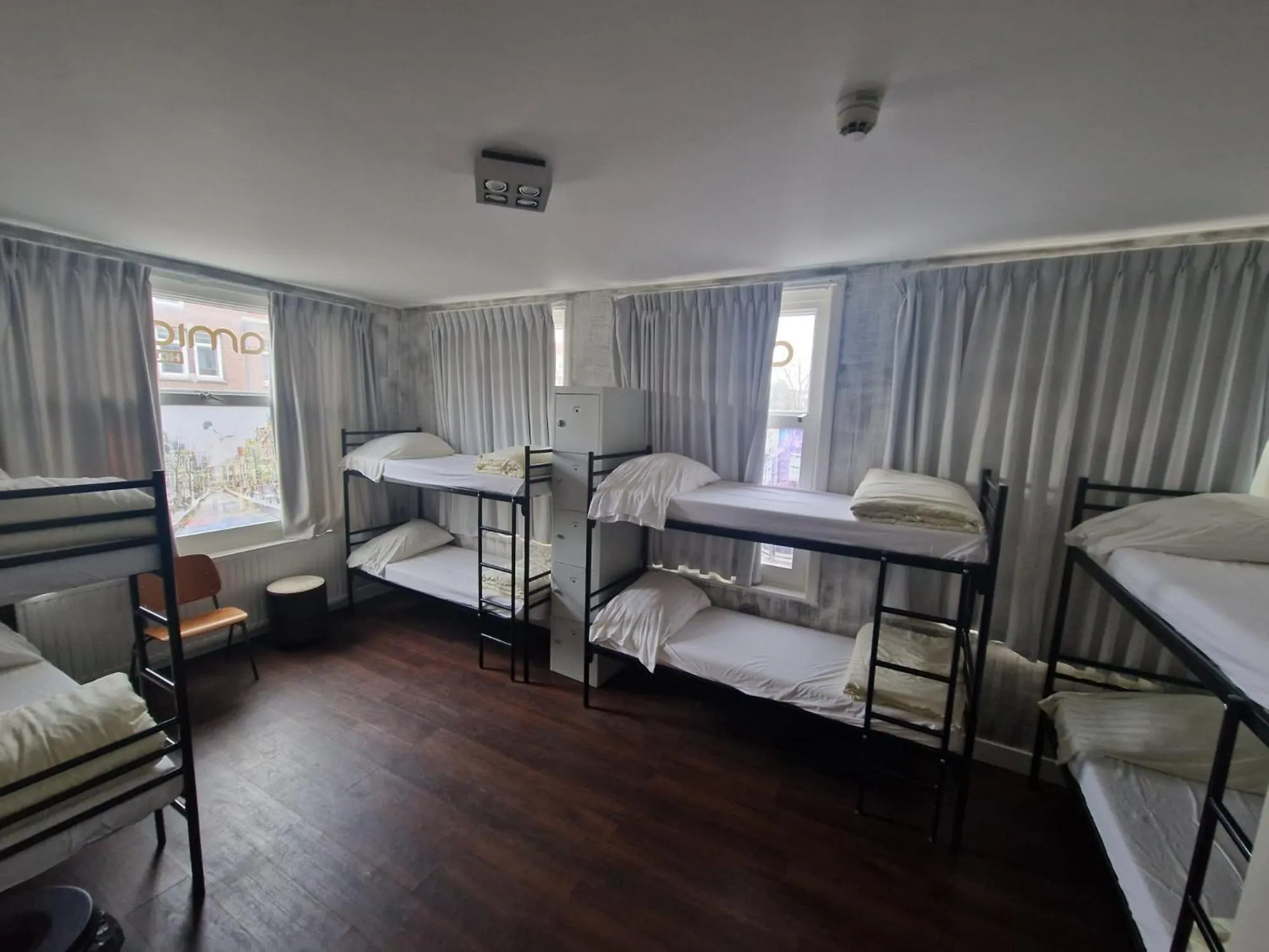 Property building, Bed in Amigo Budget Hotel