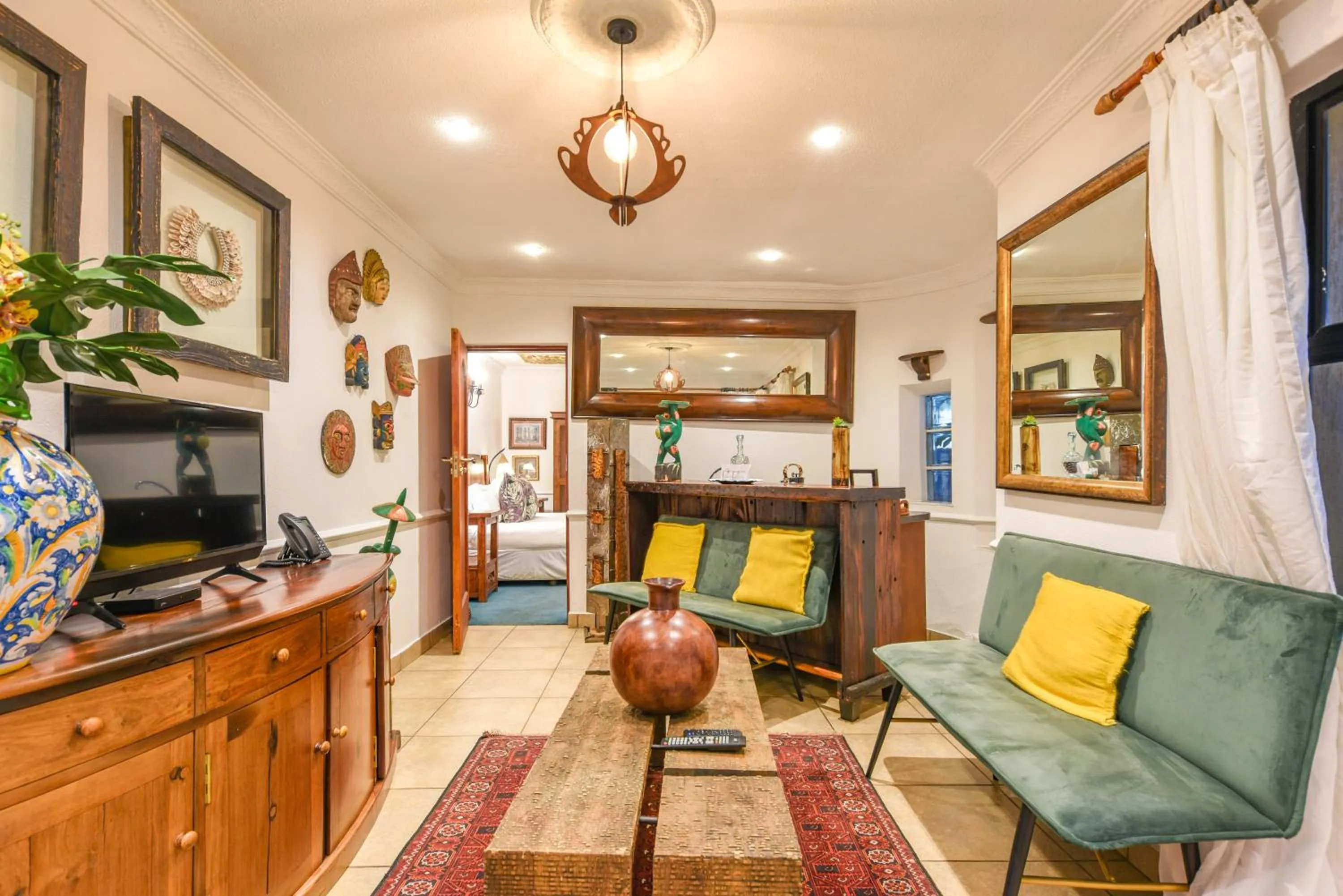 Communal lounge/ TV room in Villa Simonne