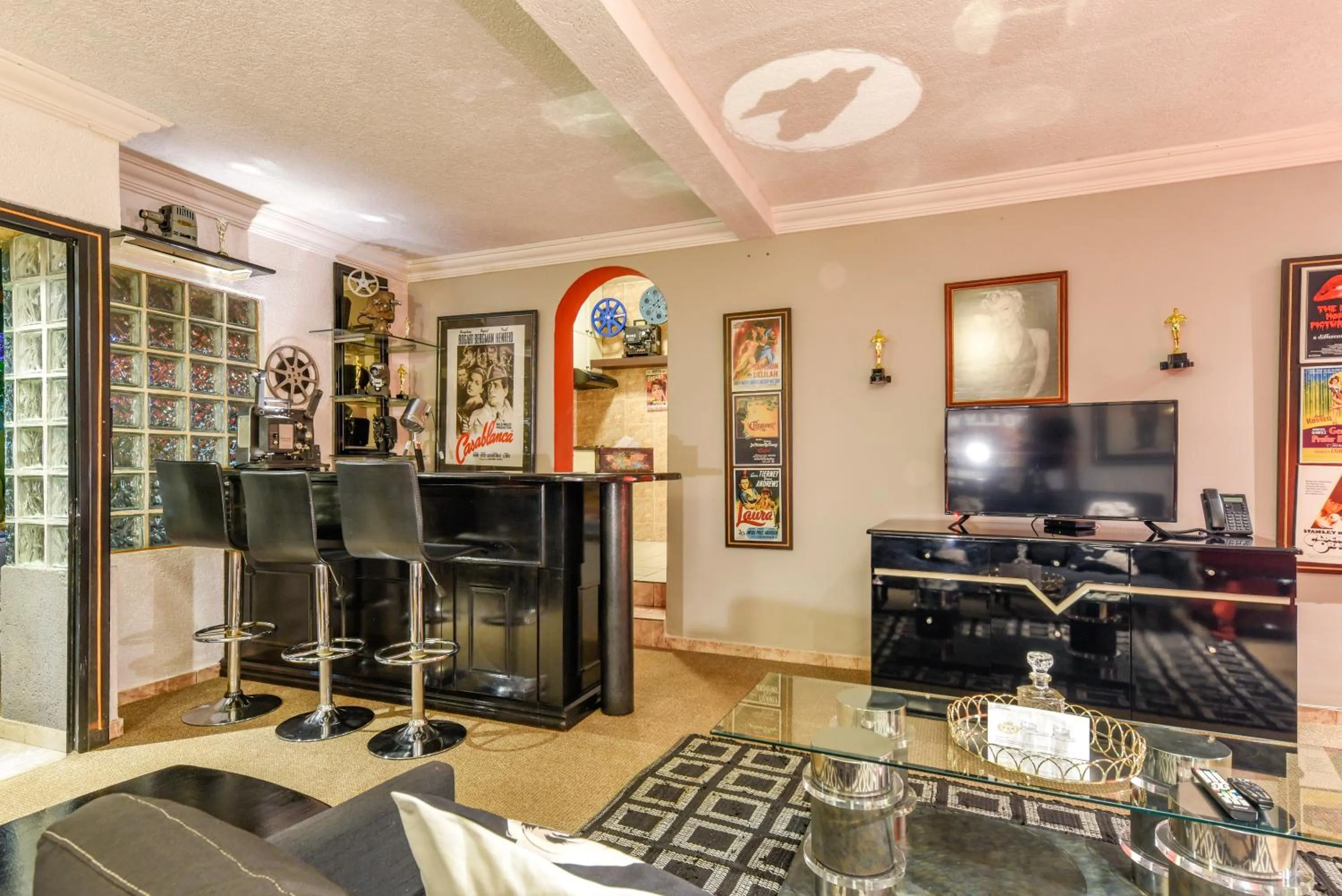 Communal lounge/ TV room in Villa Simonne