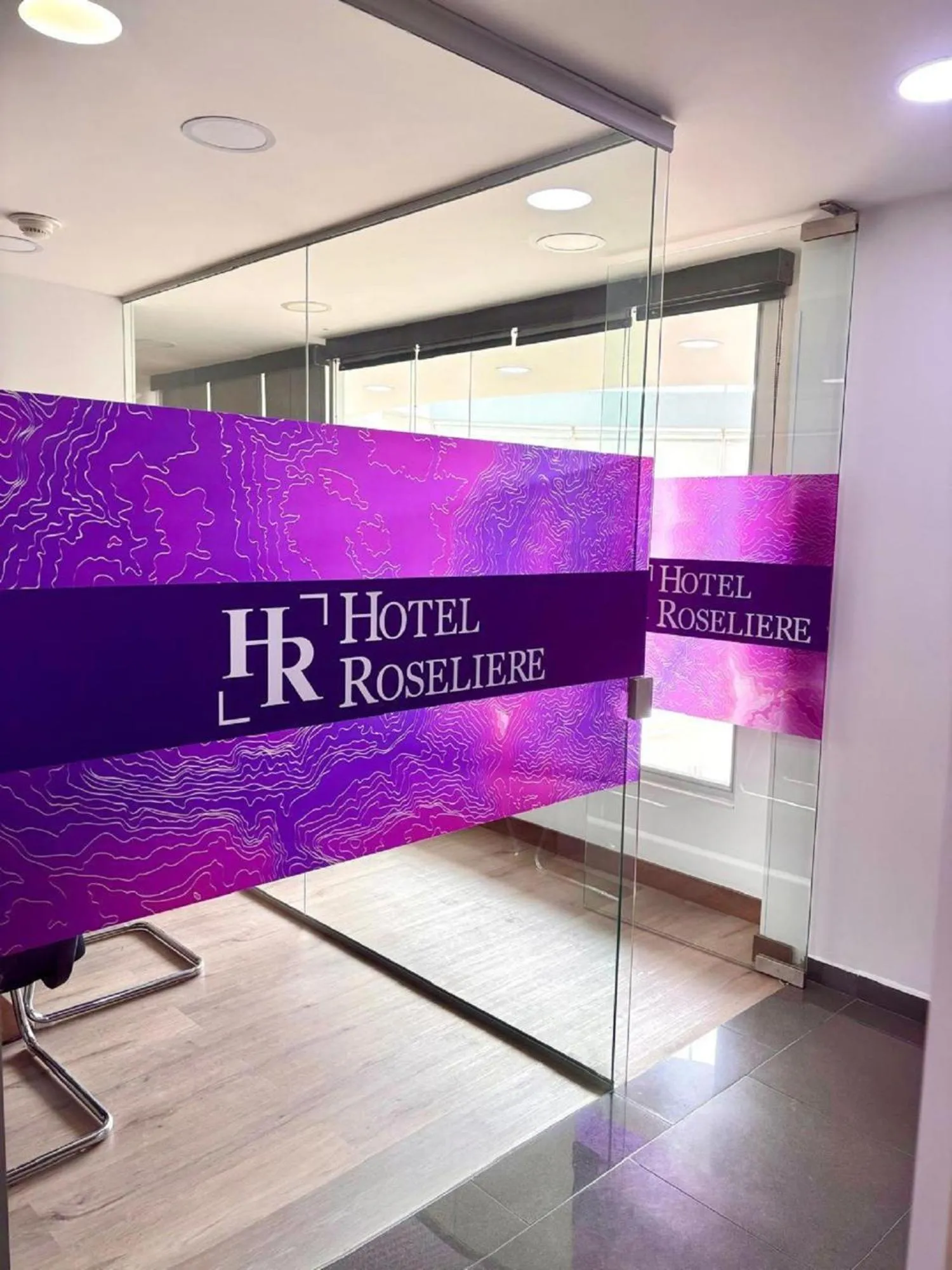 Logo/Certificate/Sign in Hotel Roseliere Bucaramanga