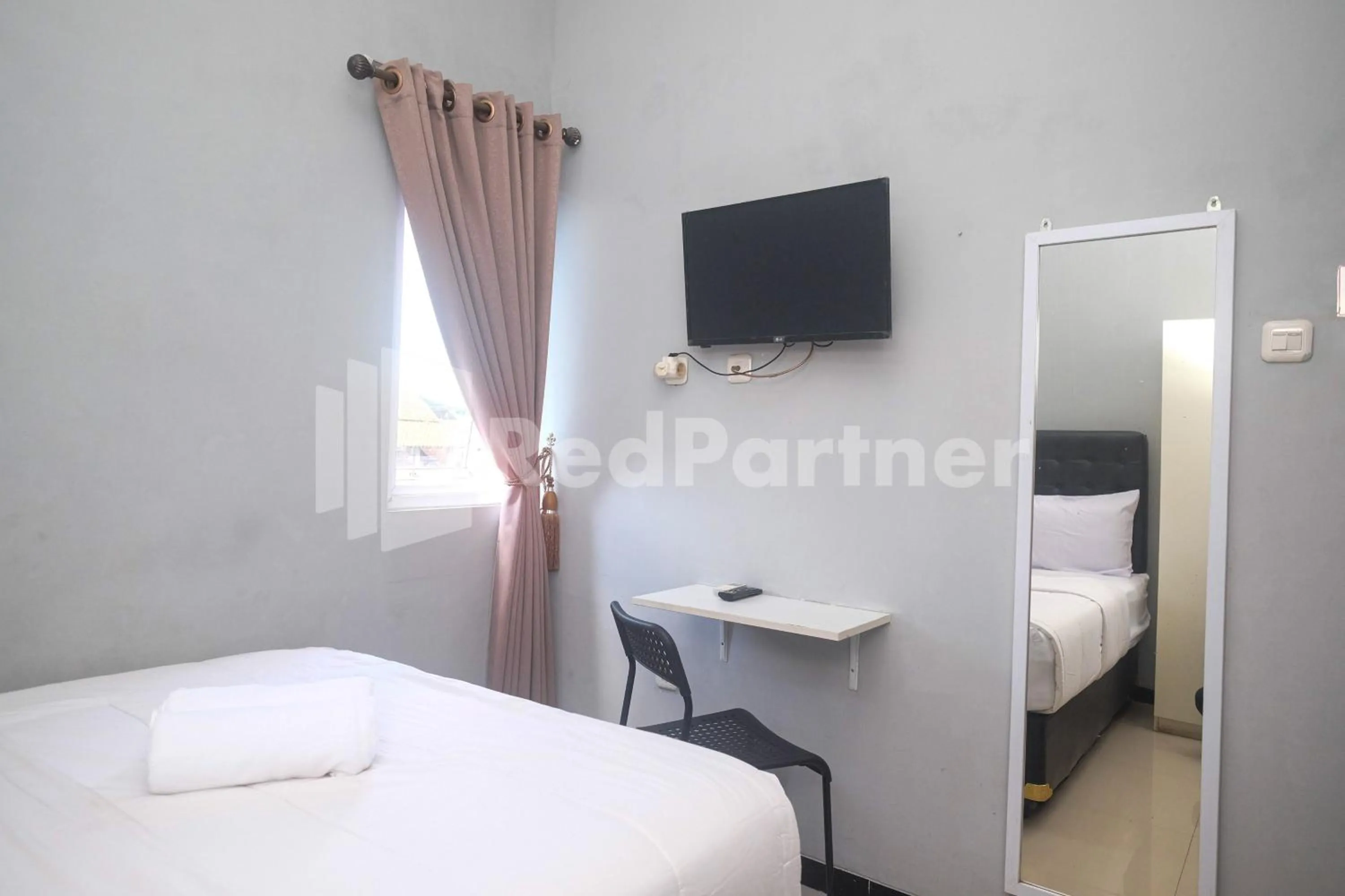 Bed in Griya Loka 1 Syariah Near RSUD Dr Kariadi Mitra RedDoorz