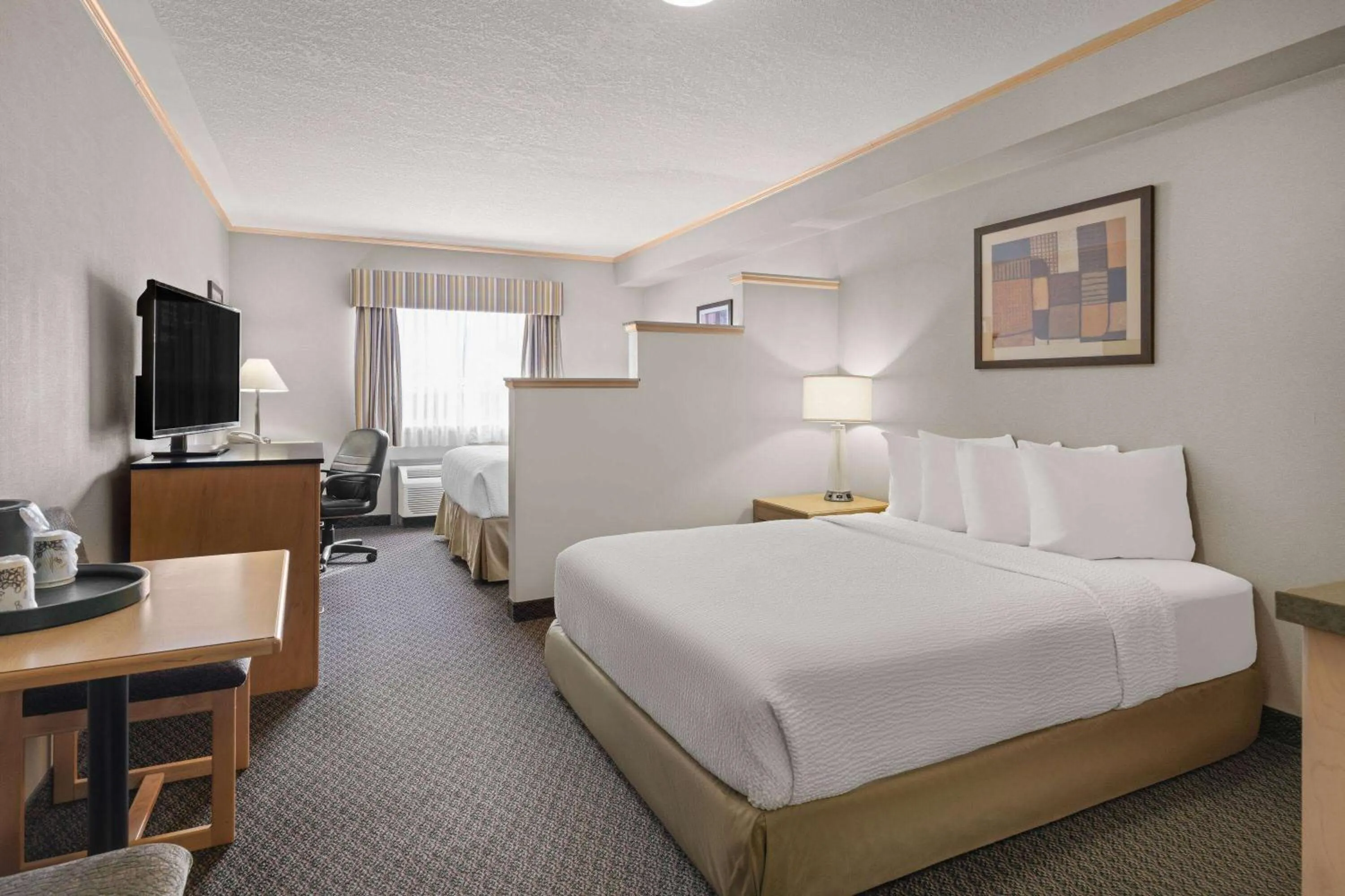 Photo of the whole room, Bed in Travelodge by Wyndham Fort McMurray