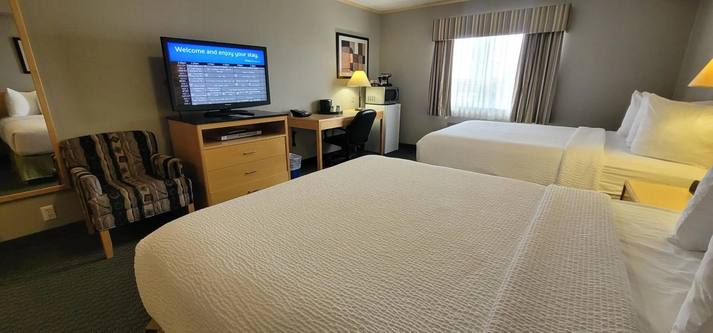 Photo of the whole room, Bed in Travelodge by Wyndham Fort McMurray