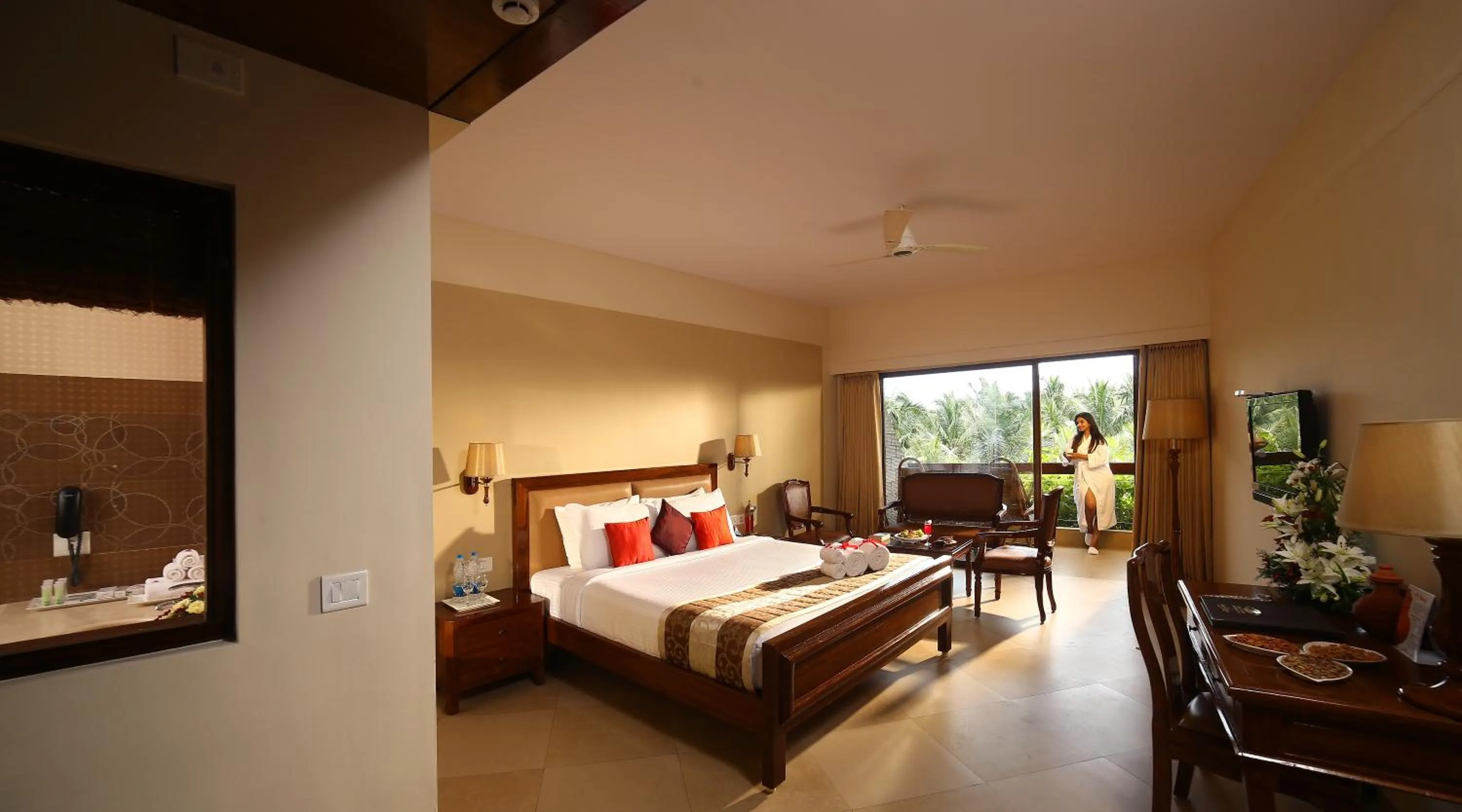 Bedroom, Bed in Uday Suites - The Airport Hotel