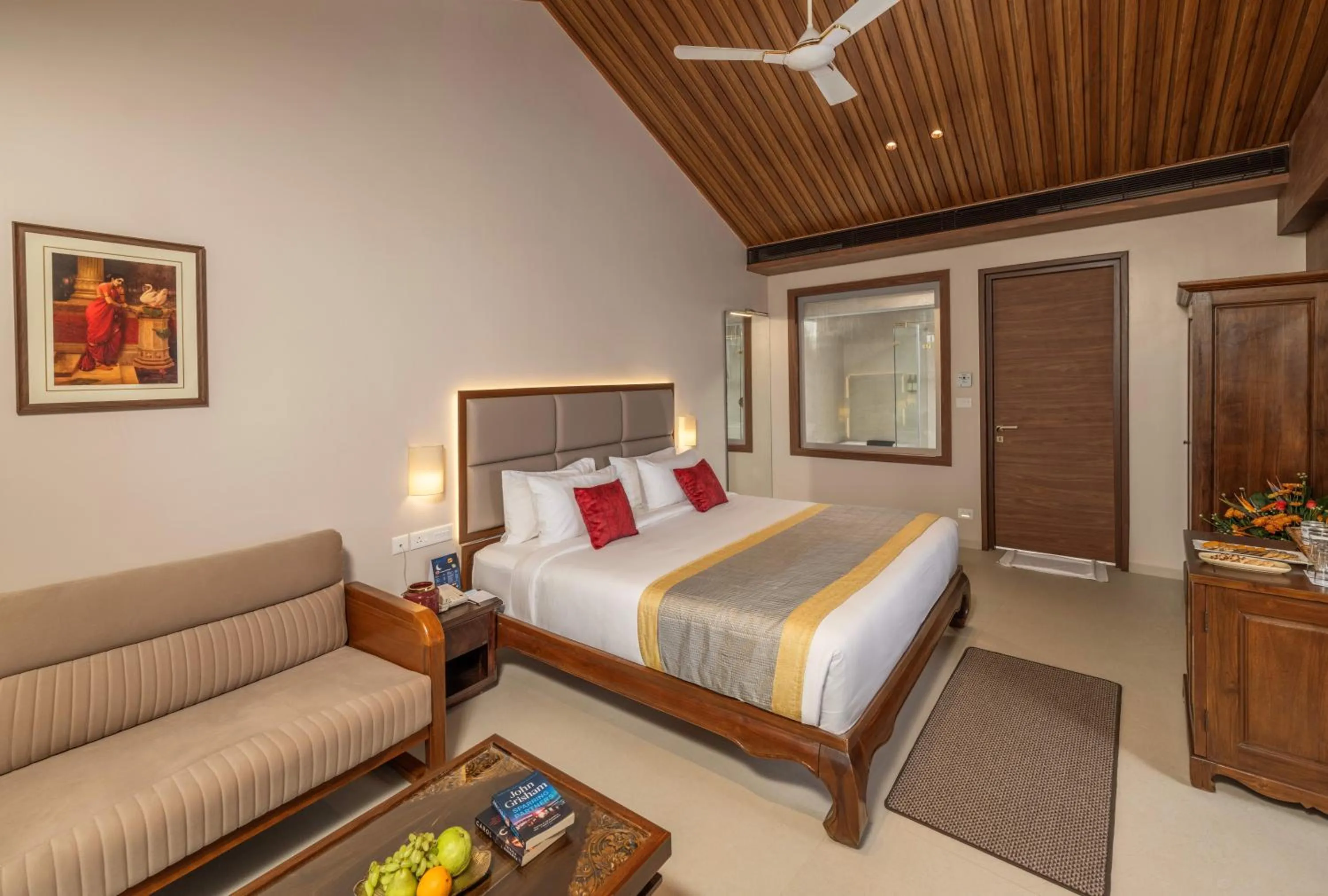Bedroom, Bed in Uday Suites - The Airport Hotel