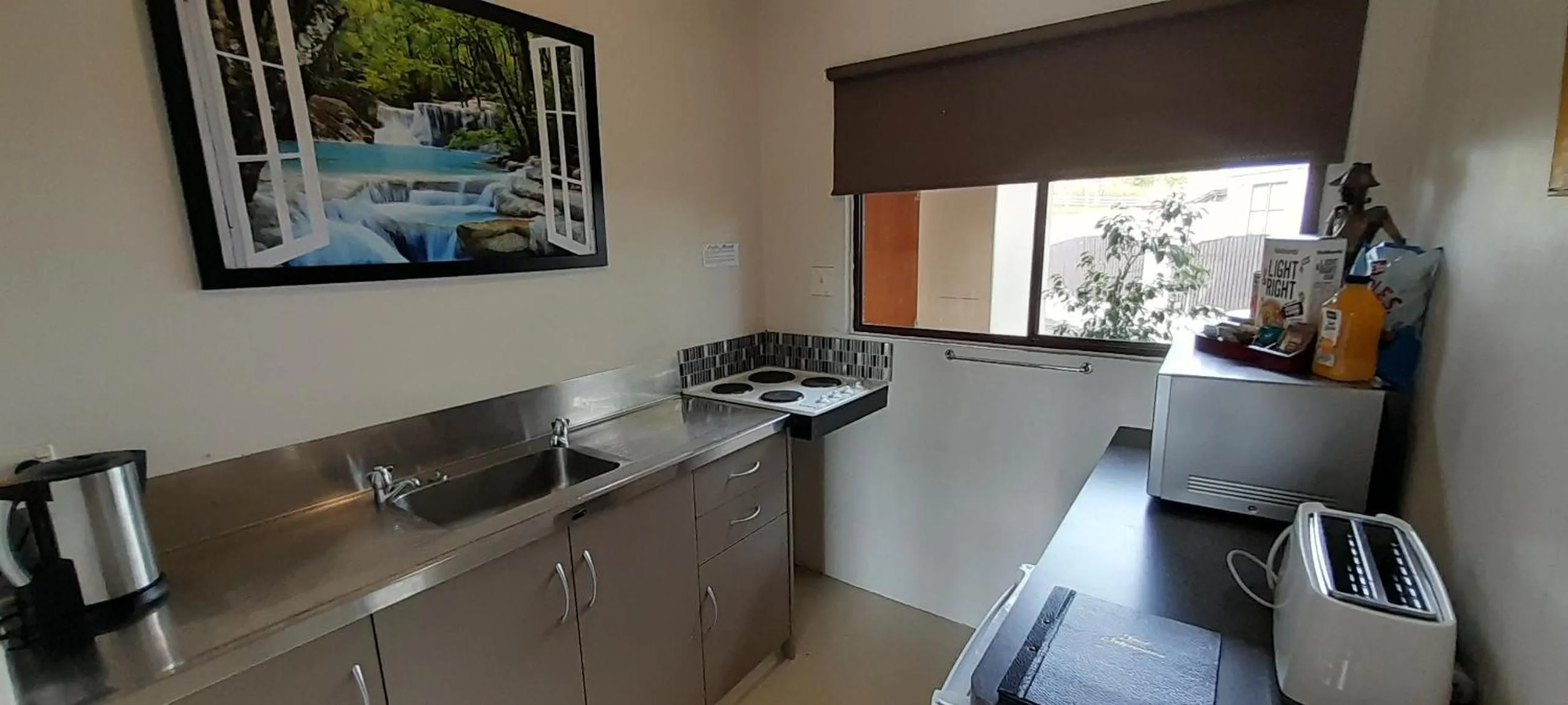 Kitchen or kitchenette in Waterfalls Estate - Motel & Campground