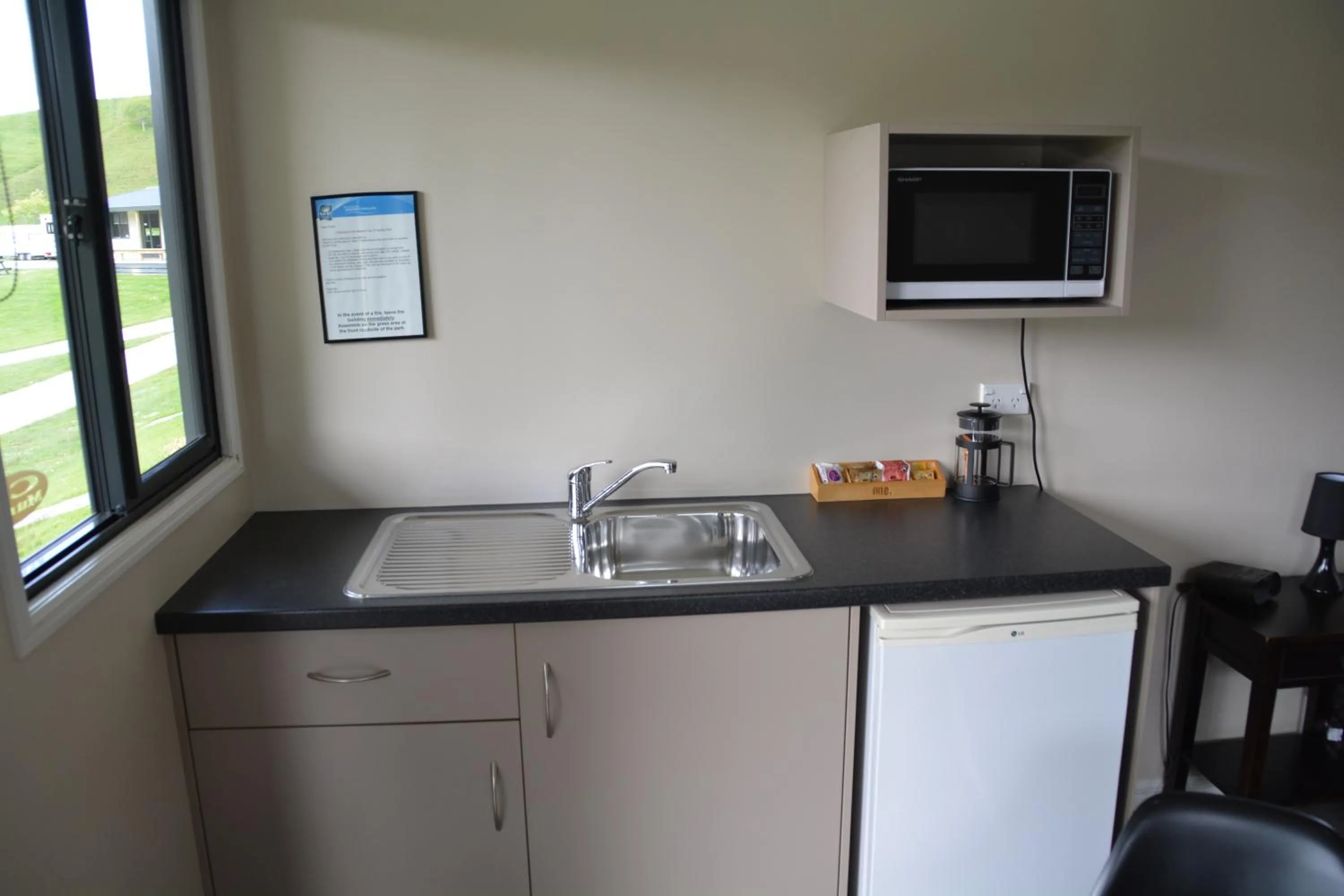 Kitchen or kitchenette in Waitomo TOP 10 Holiday Park