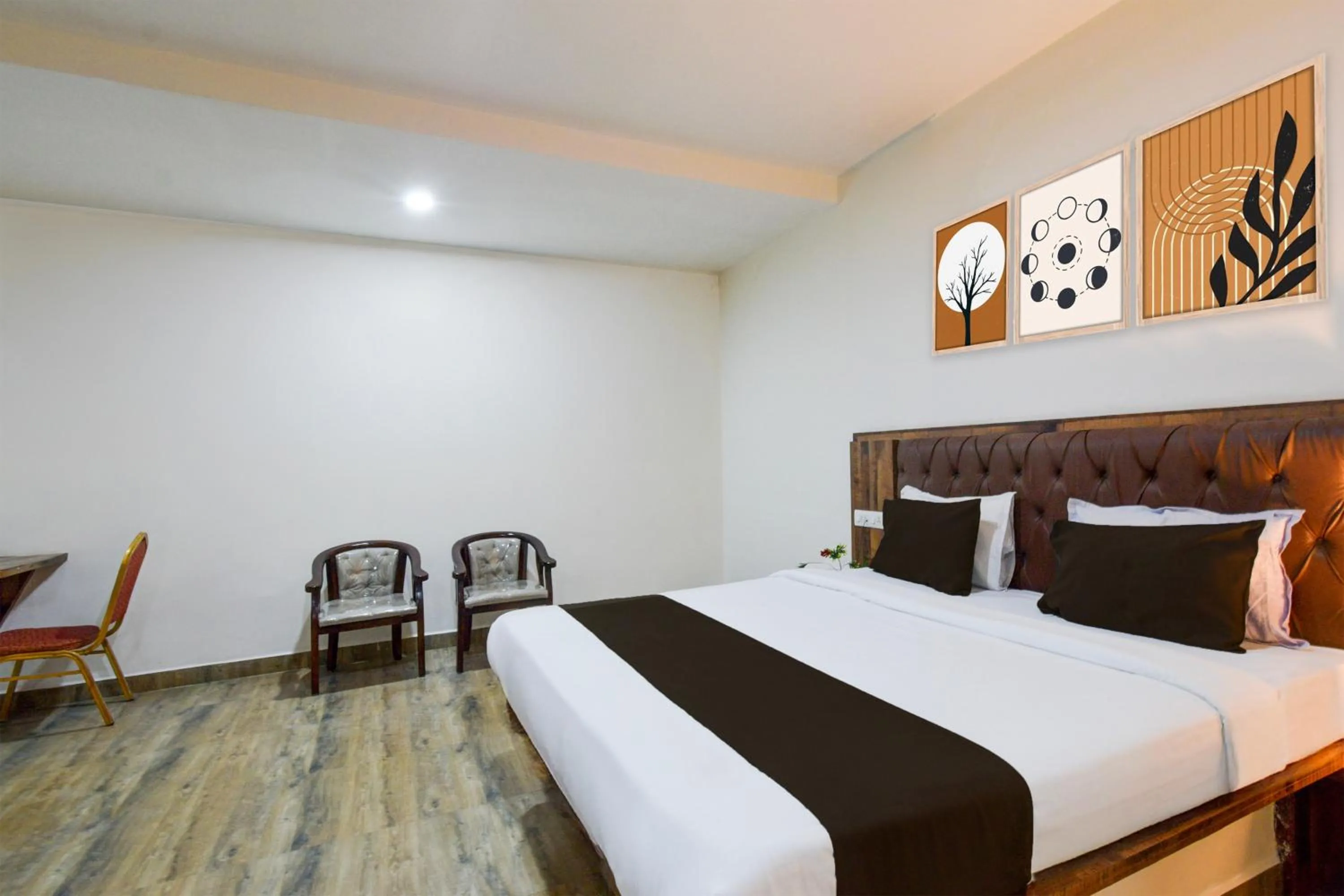 Bedroom, Bed in Super Townhouse Vanasthalipuram Formerly Hotel Surabhi